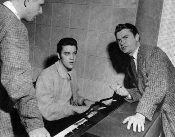 The quartet - Smokey Joe Baugh, Elvis and Sam Phillips at Sun - Dec. 4, 1956.jpg