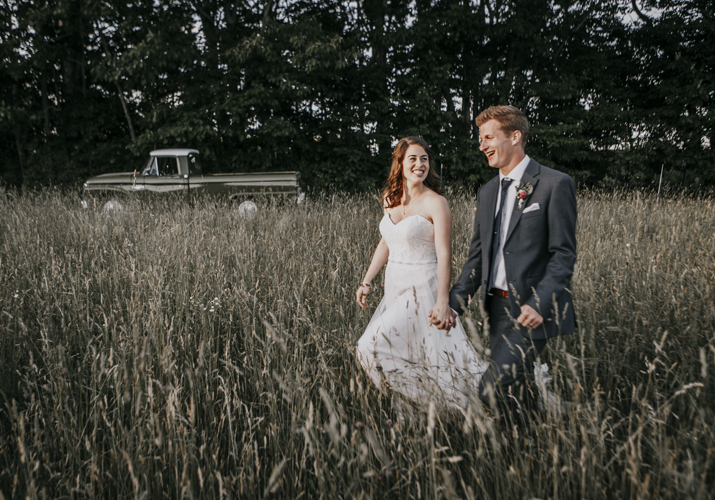 Bride and groom in field, Broadturn Farm