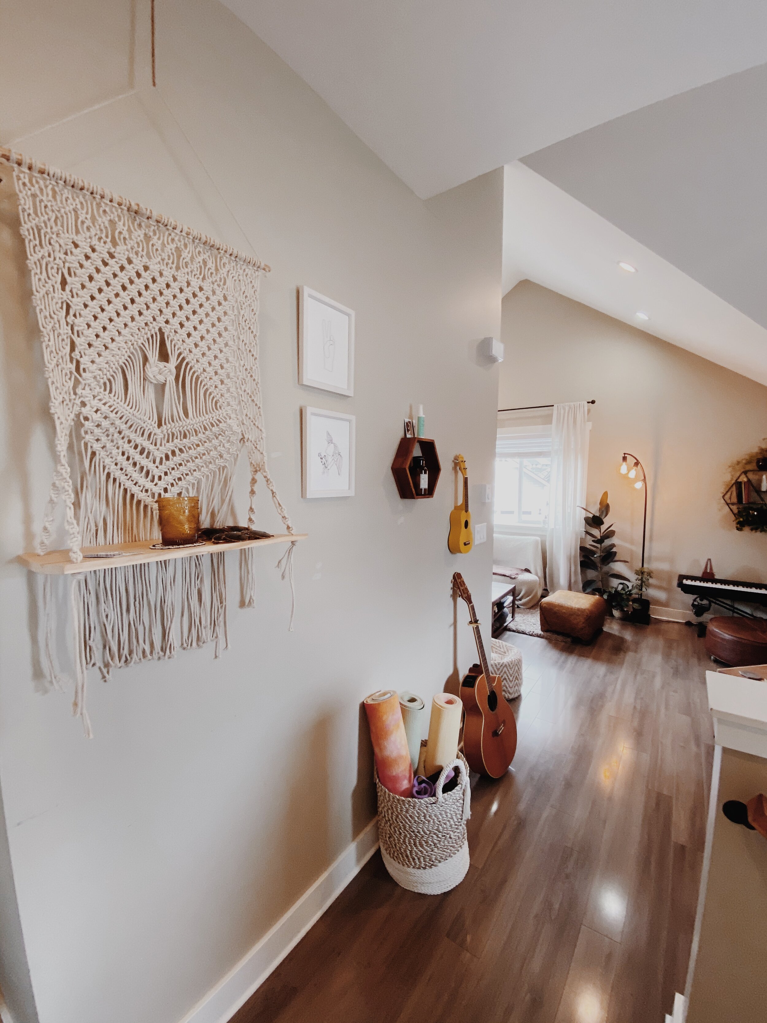  I keep sunglasses, headphones and lip balm on this hanging macrame shelf above my stairs so I don’t forget to grab what I need on my way out. 