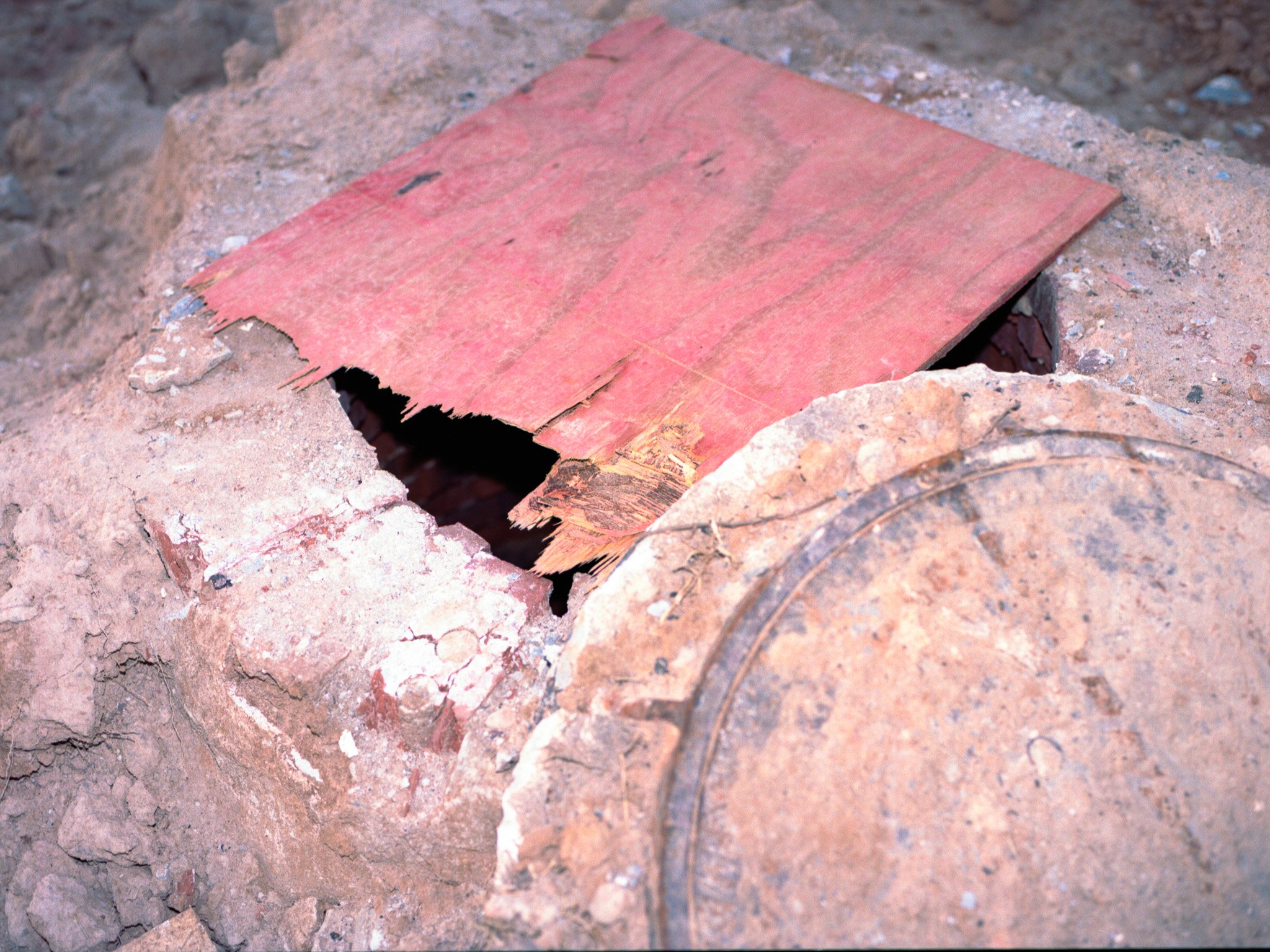 Red Board Over Hole.jpg