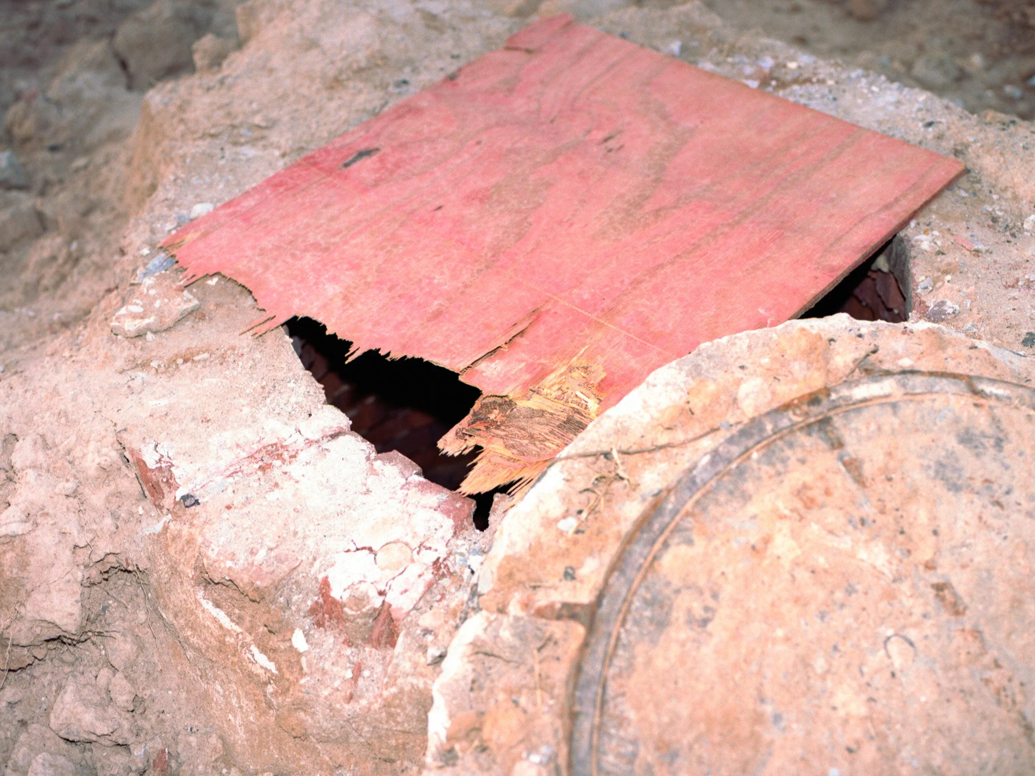 Red Board Over Hole.jpg