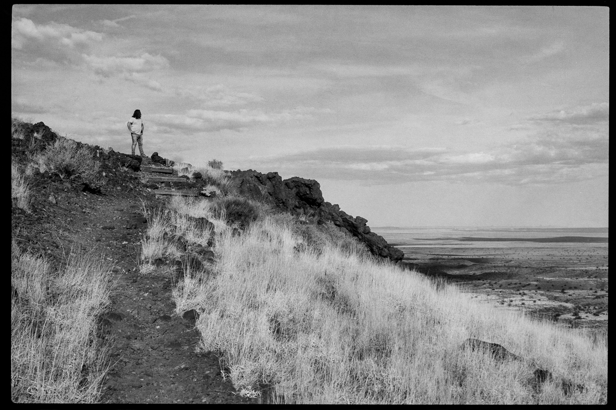 The small footpath curling around to the top of Doney Mountain with the desert all around