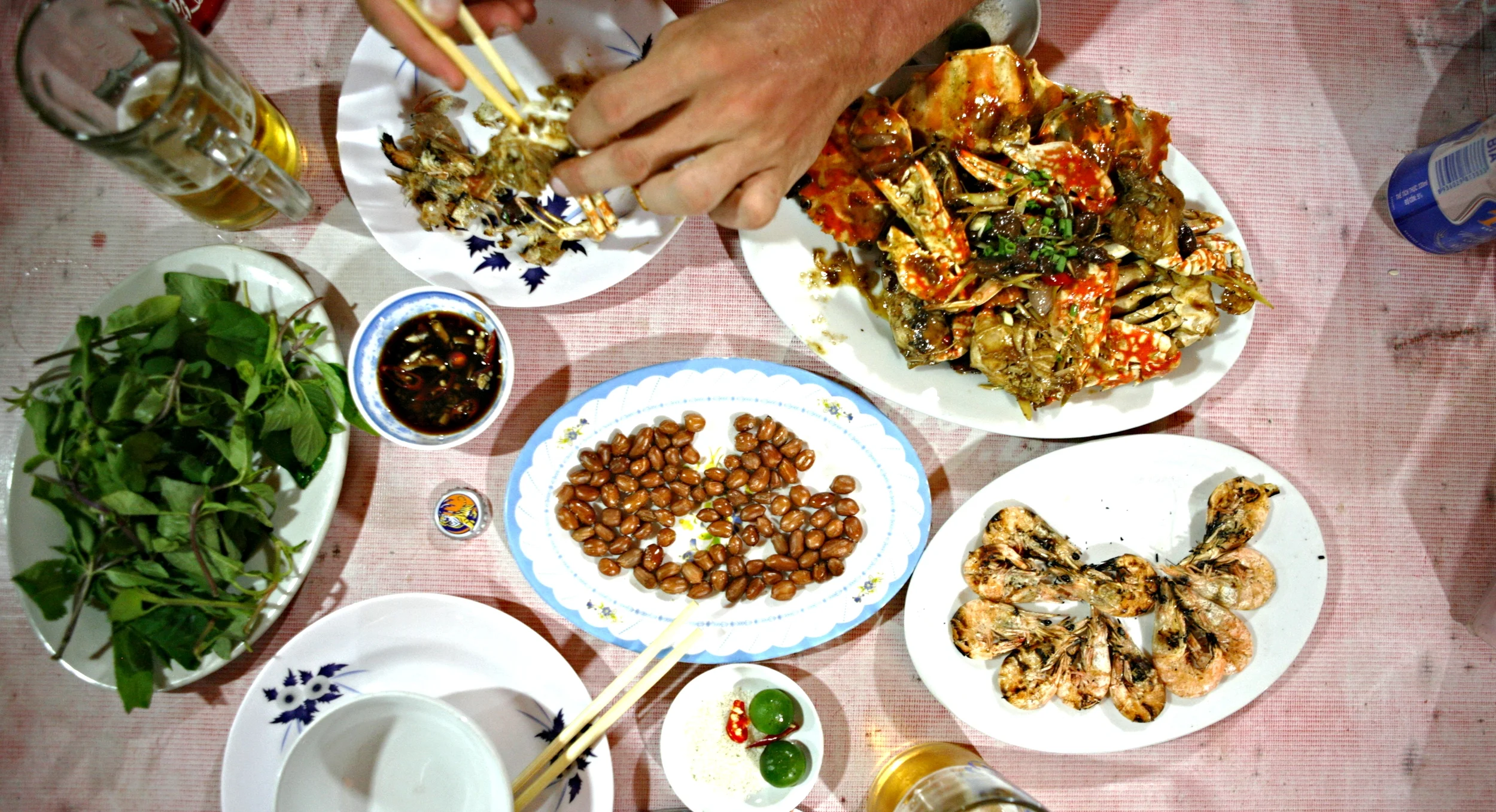 Our Ha Long Bay seafood feast of grilled shrimp, salted skin on peanuts and tamarind crab