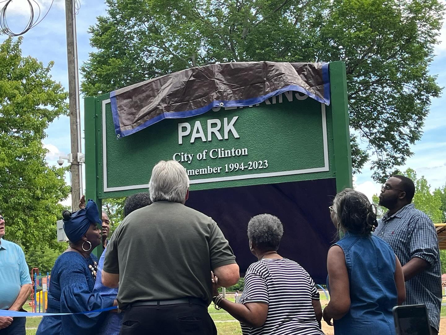 Unveiling the sign and ribbon cutting at the renamed park on Thursday