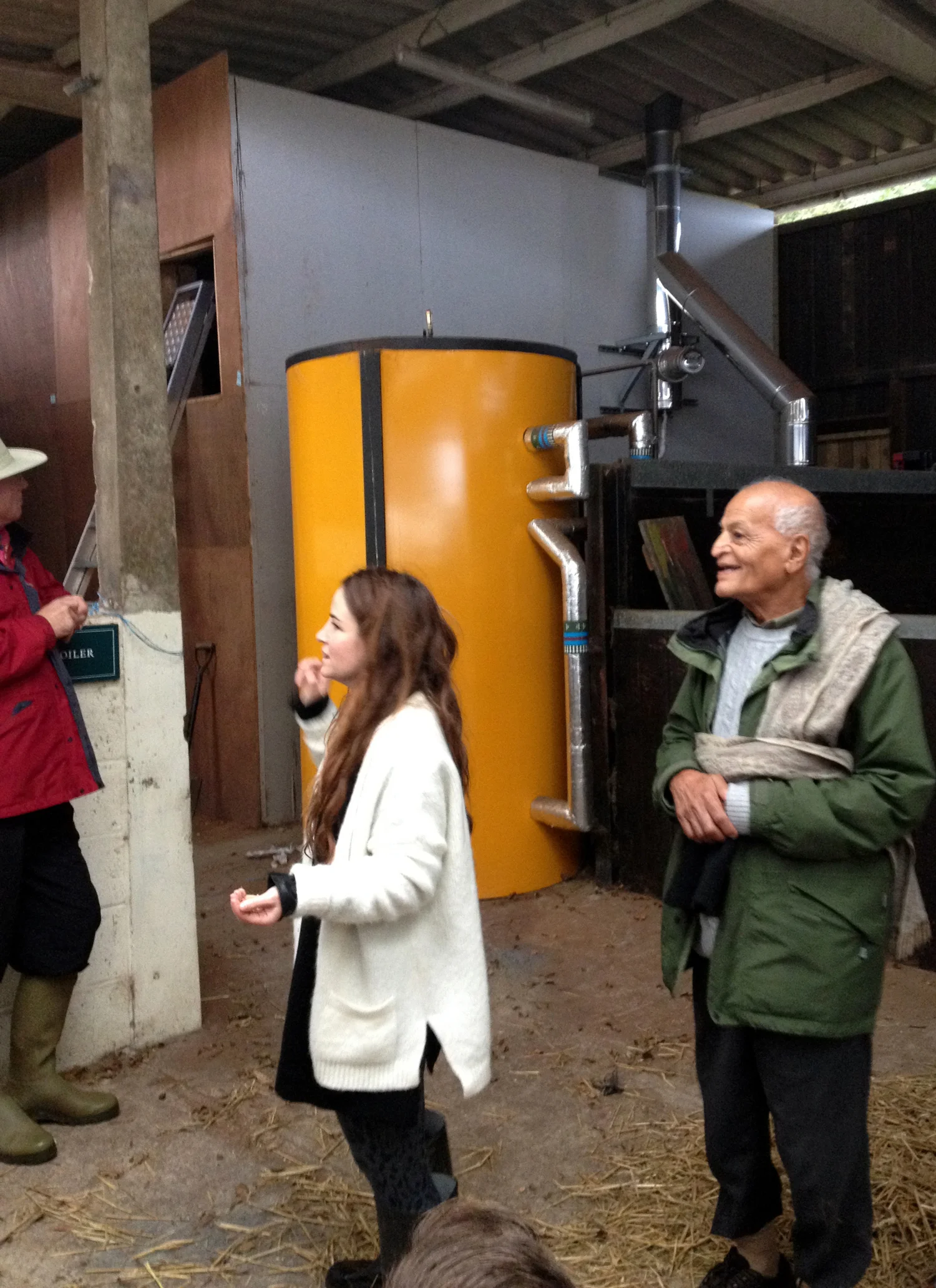 42 Acres founder, Lara showing us the biomass boiler
