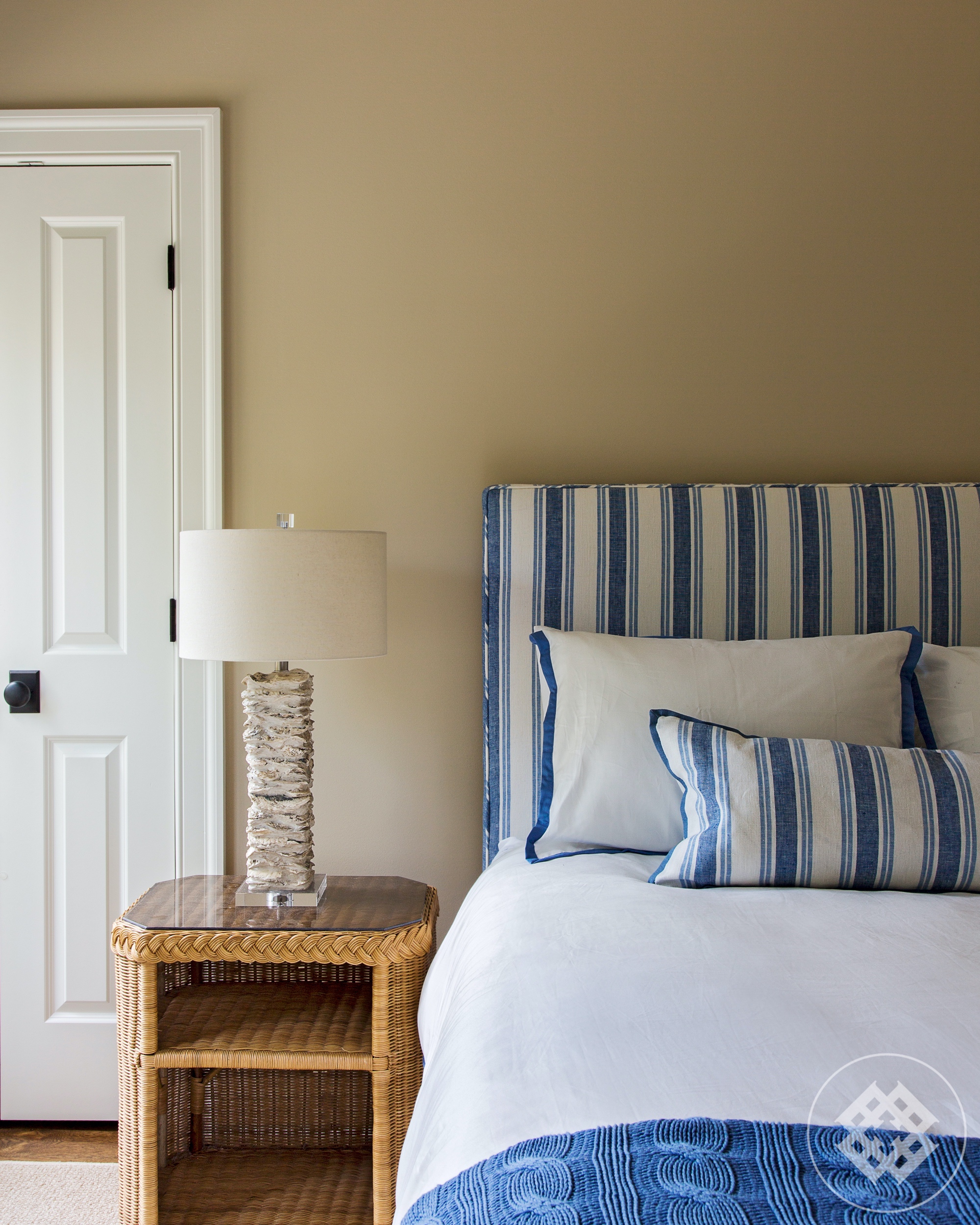 hss-bedroom-tabby-shell-lamp-custom-fabric-headboard.jpg