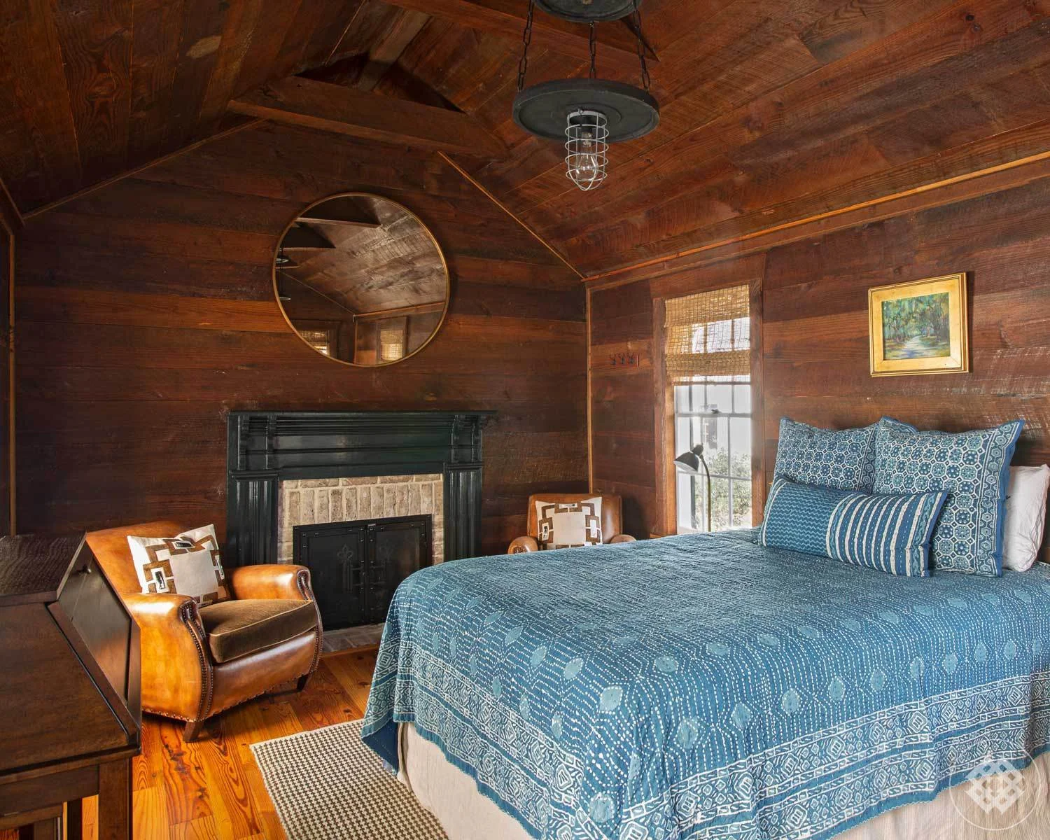 mfh-guest-bedroom-cypress-siding-brick-hearth-fireplace.jpg