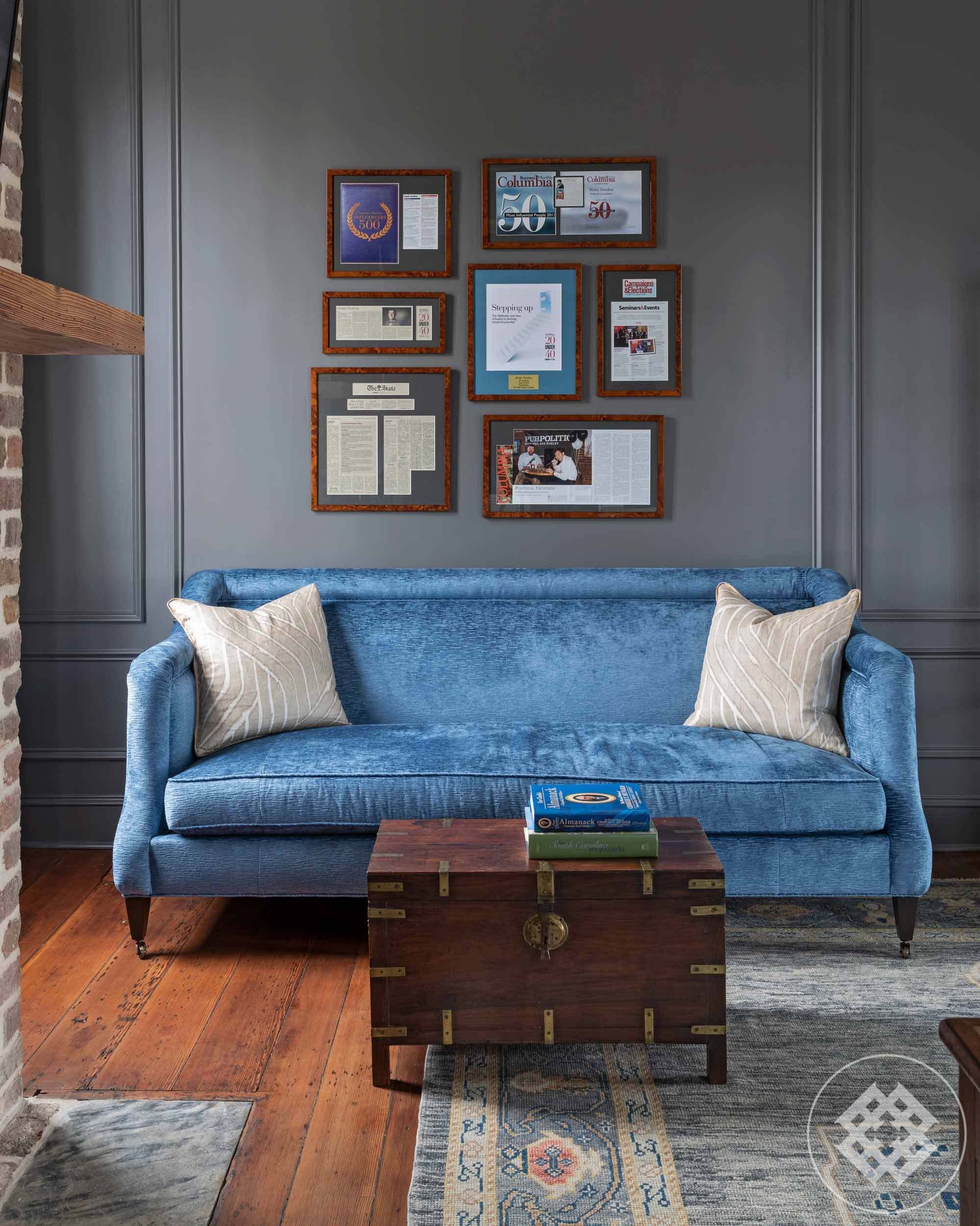 blue-velvet-sofa-antique-campaign-chest.jpg