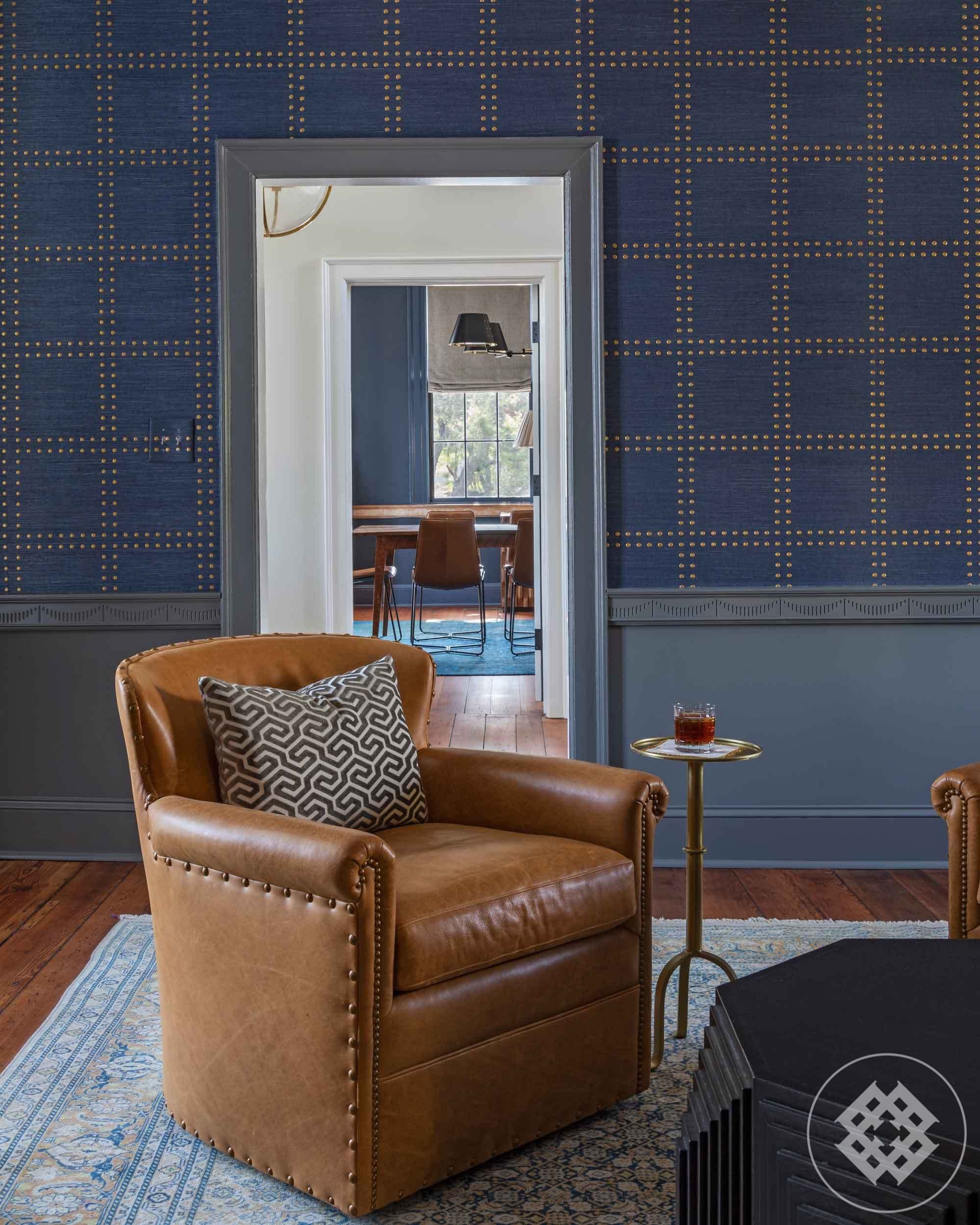 caramel-leather-club-chair-brass-nails-philip-jeffries-grass-cloth-wallpaper.jpg