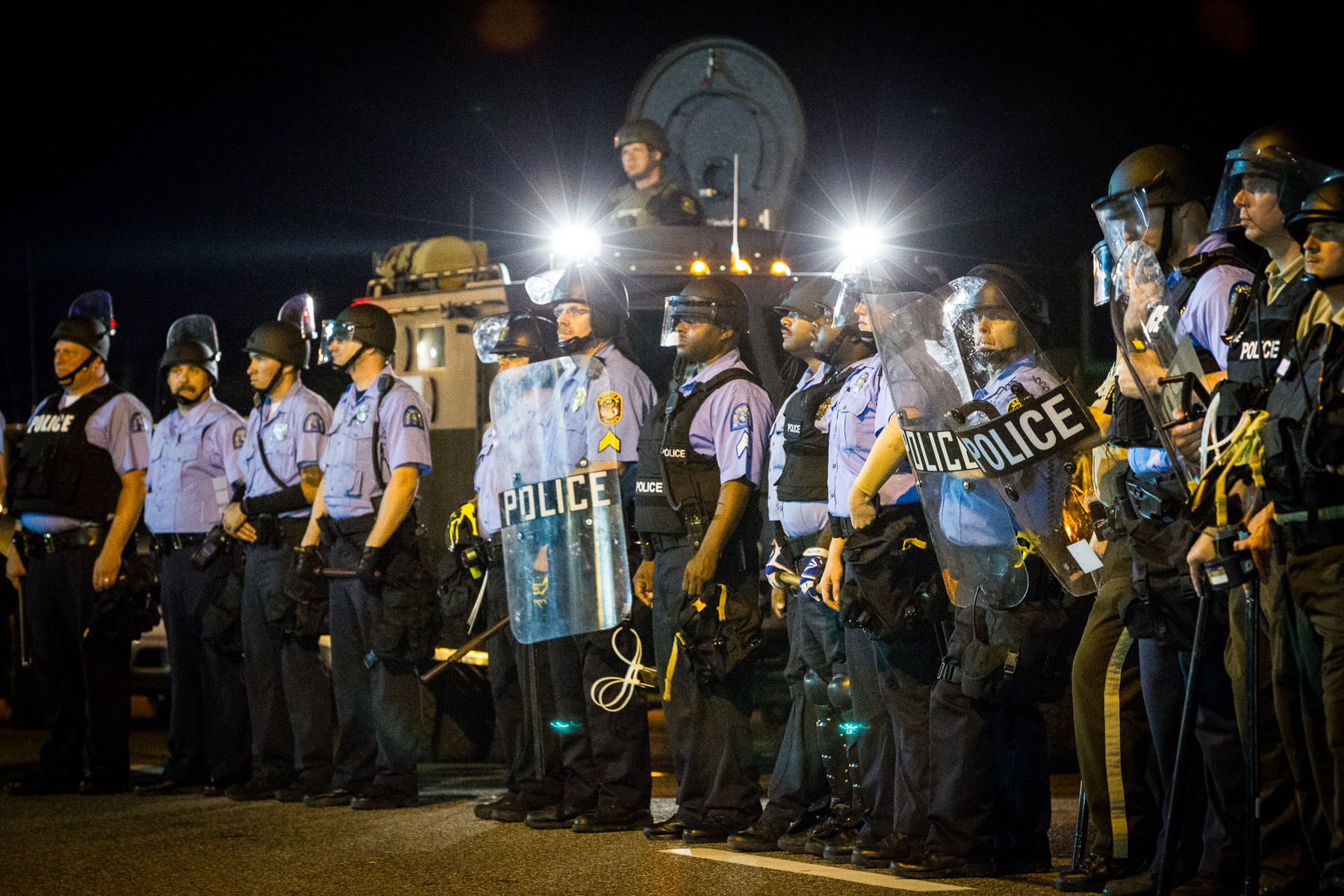 Heavily armed police form a blockade during the Ferguson Riots.