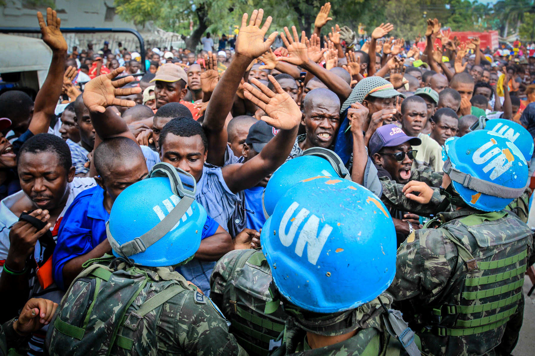 UN soldiers struggle to contain a crowd trying to reach aid in the aftermath of the 7.0 magnitude earthquake in Haiti in 2010.