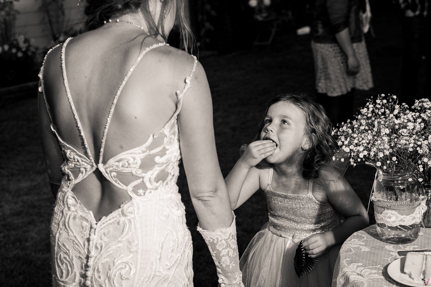 candid photographers wedding cake ate by girl (2).jpg
