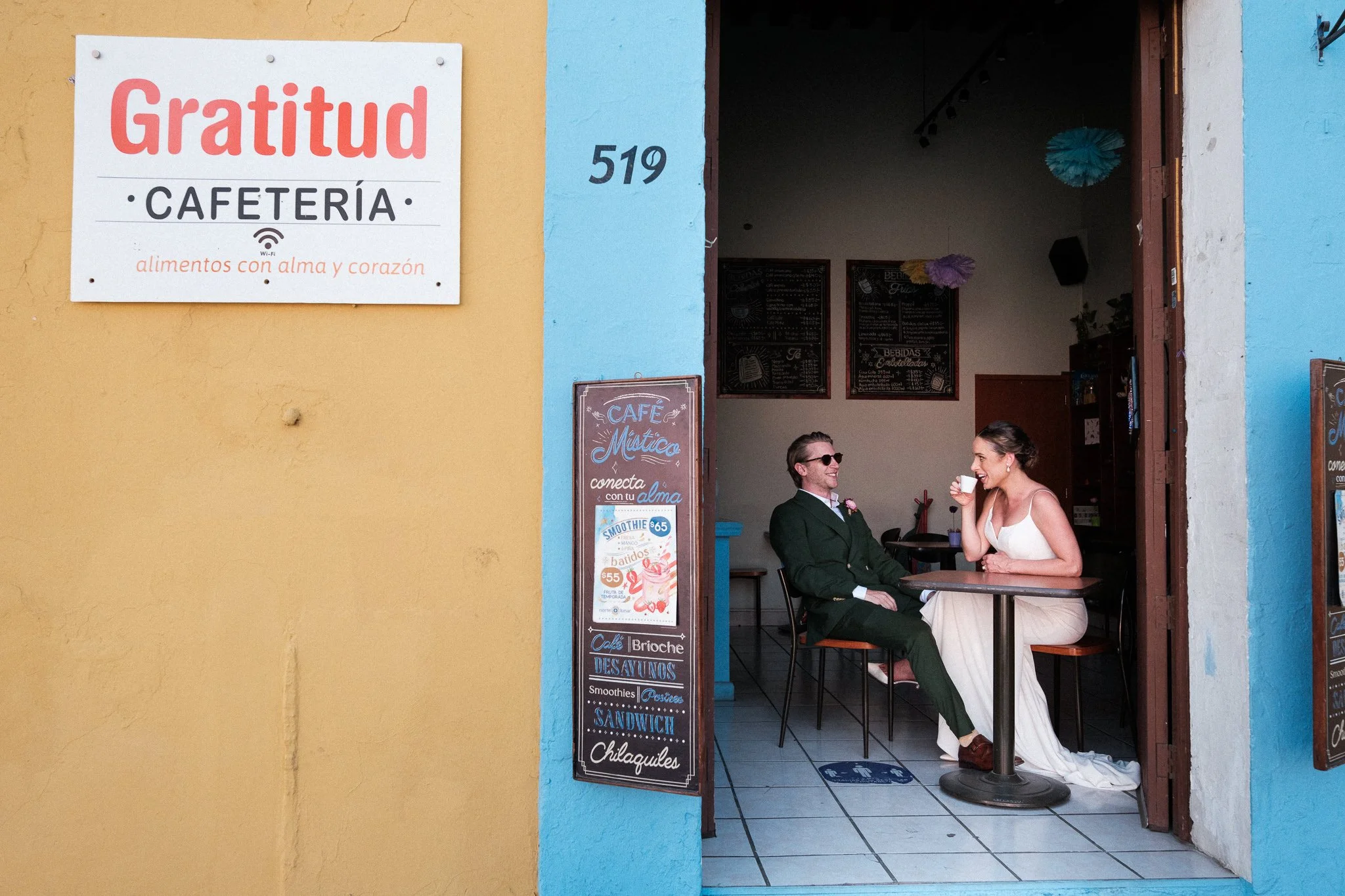 oaxaca-wedding-photographer-bride-and-groom-at-coffee-shop-in-oaxaca-1.jpg