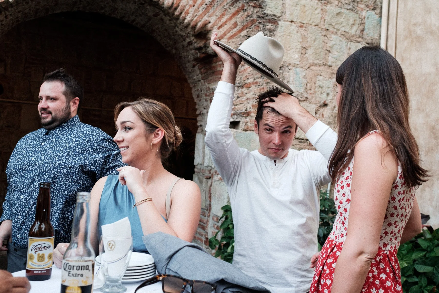 Candid guest interactions during the wedding cocktail at Hotel Quinta Real.
