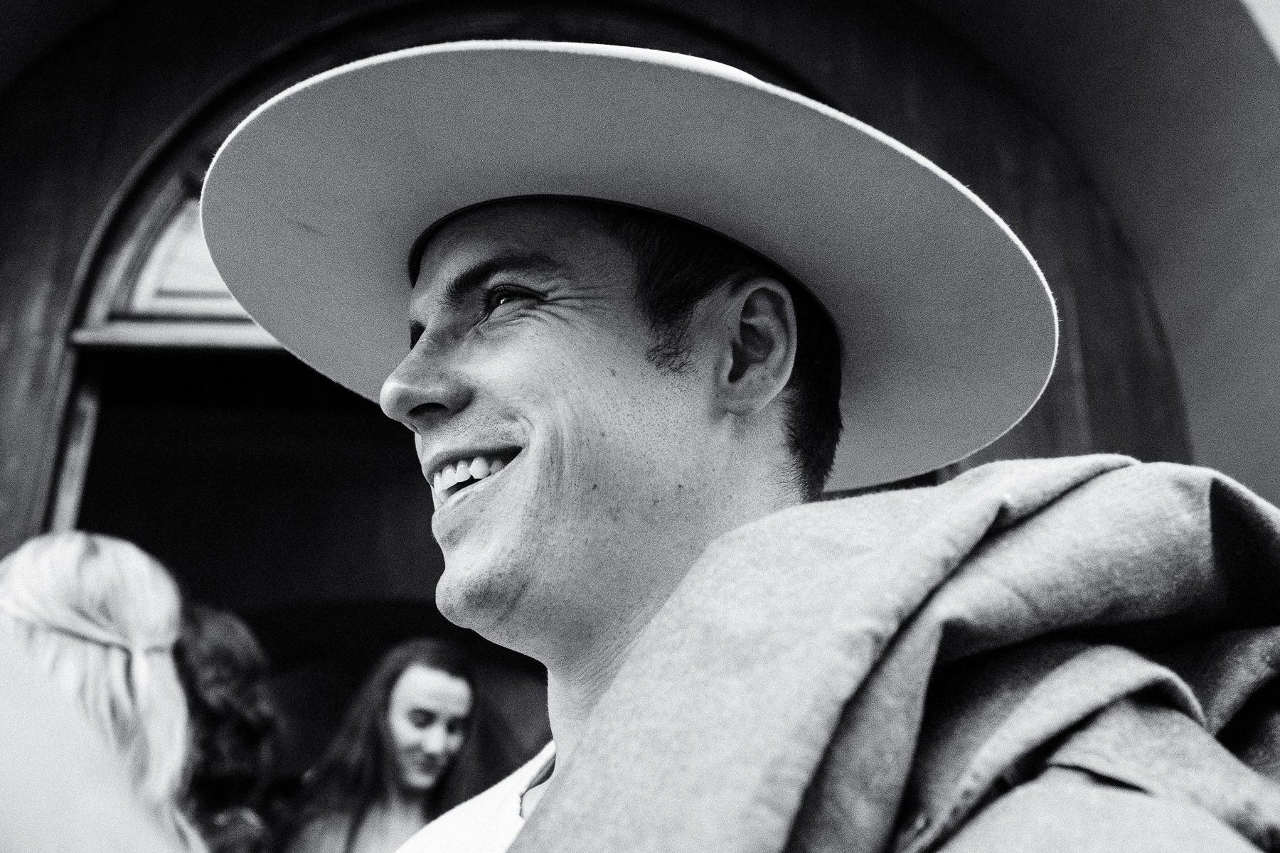 A candid moment of joy during the traditional Oaxacan wedding parade, by Lucca Lazzarini.