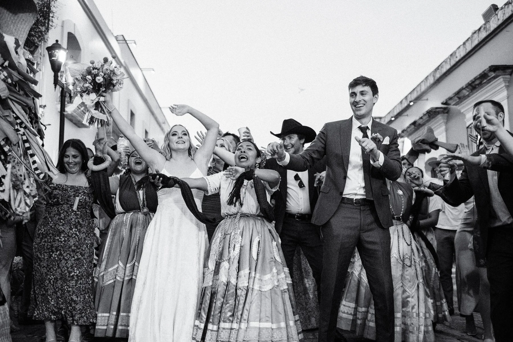 Dancing through the streets of Oaxaca during a traditional Calenda, captured by Lucca Lazzarini.