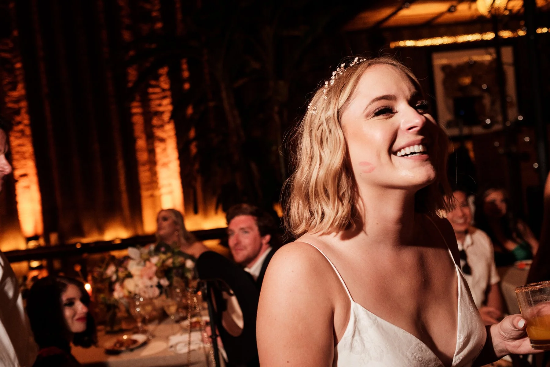 Candid moments of the bride during her wedding reception at Los Danzantes, Oaxaca.