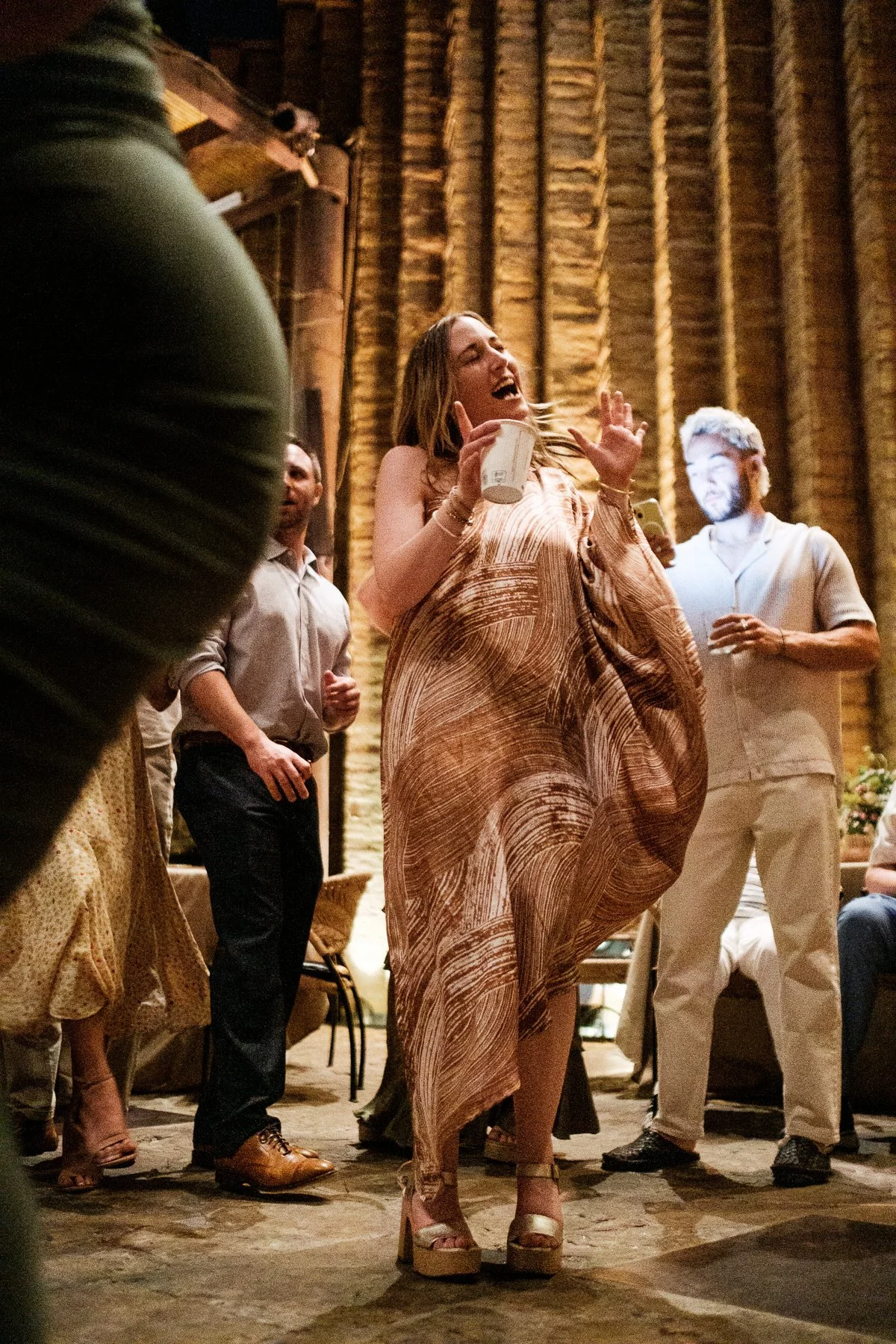 A wedding guest enjoying the dance floor at a destination celebration in Mexico.