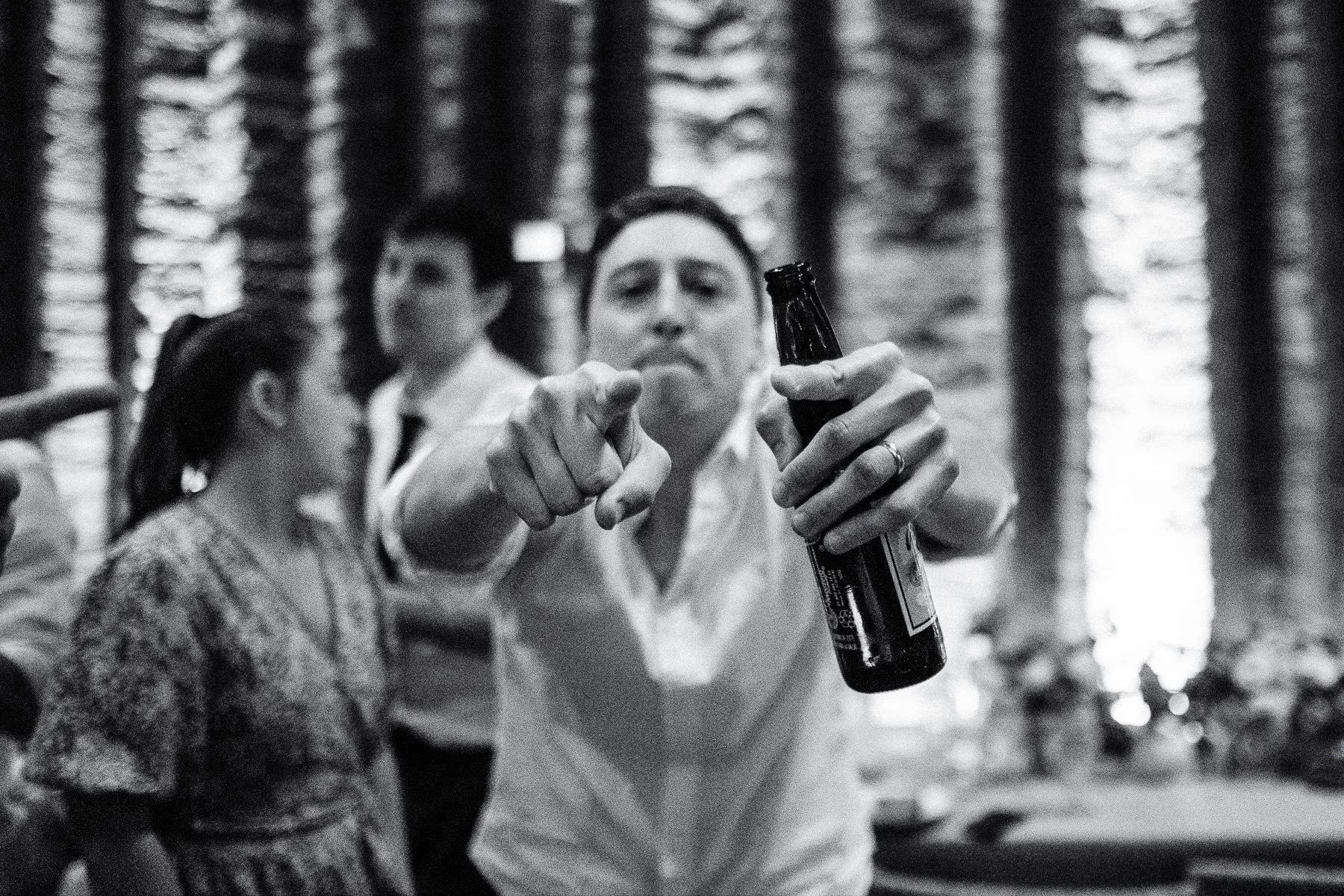 Candid guest interaction during the wedding party at Los Danzantes Oaxaca.