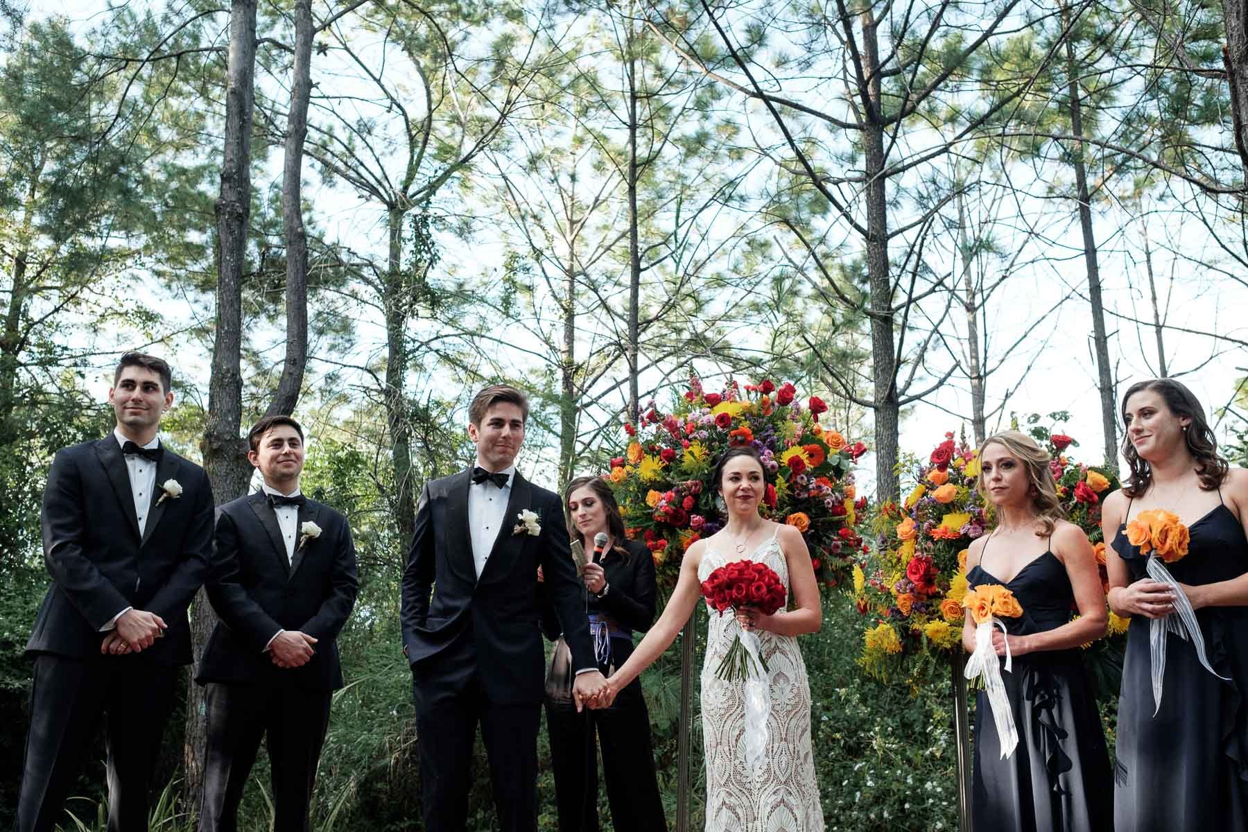 A moving documentary moment during the ceremony at Casa Dos Lagos where the couple looks back at their families and guests with emotion.