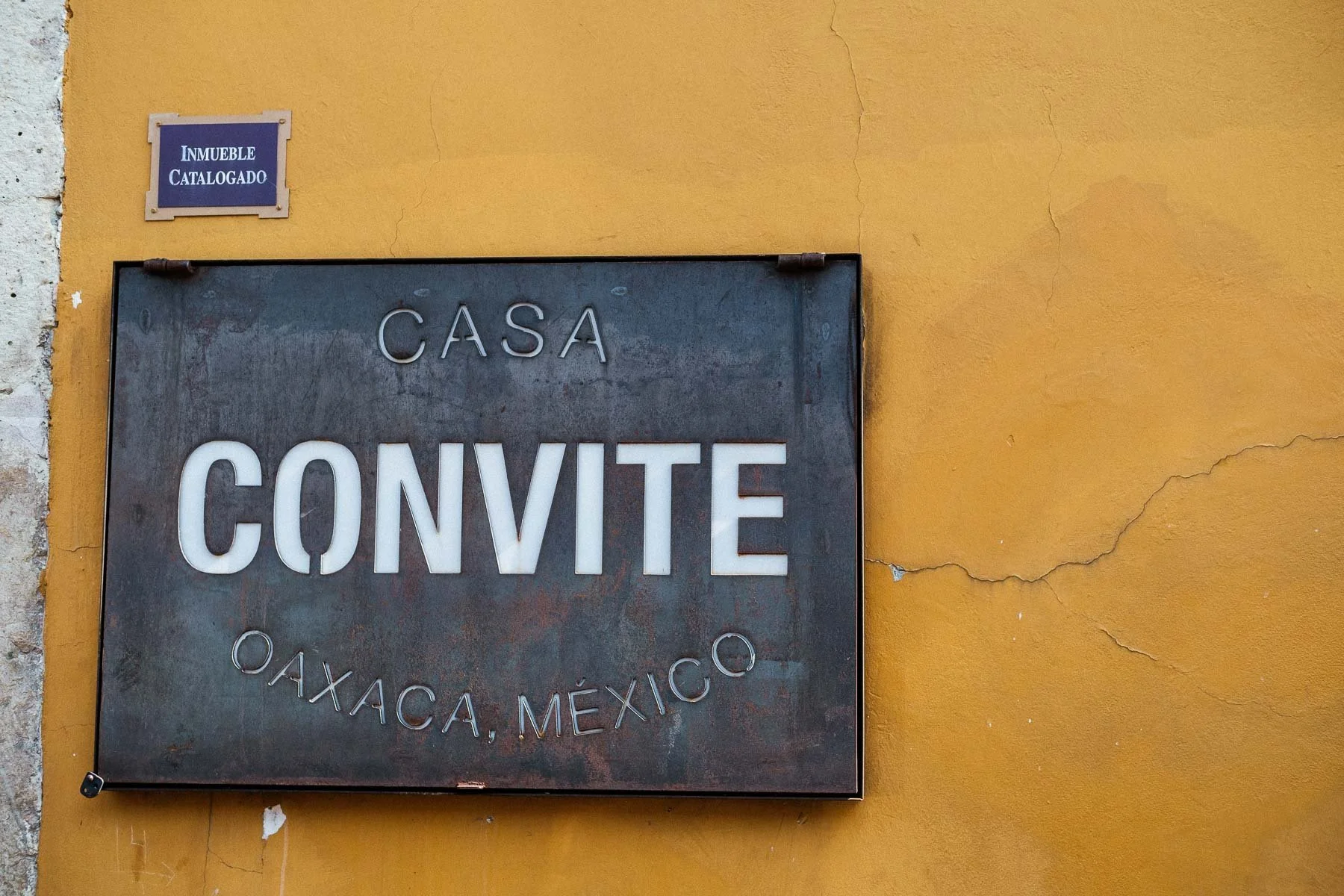 The minimalist and sophisticated entrance of Casa Convite, a premier boutique wedding venue in the heart of Oaxaca City.