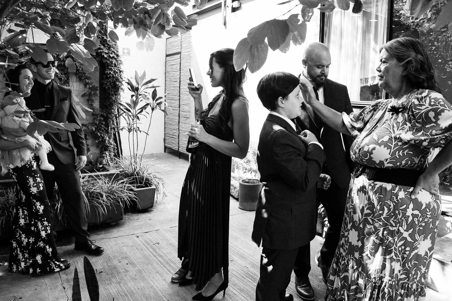 A layered documentary image showing multiple guest interactions during the preparations.
