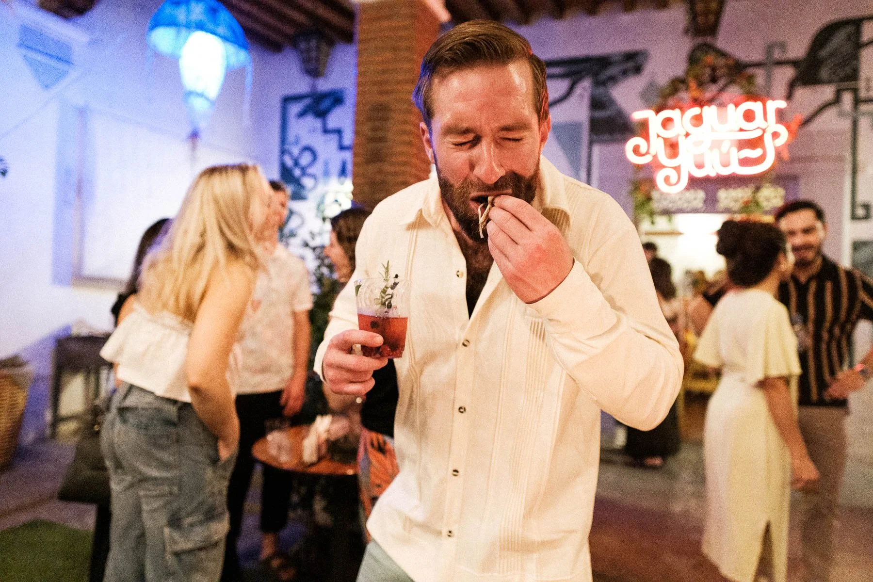 Guest enjoying local Oaxacan appetizers at the party