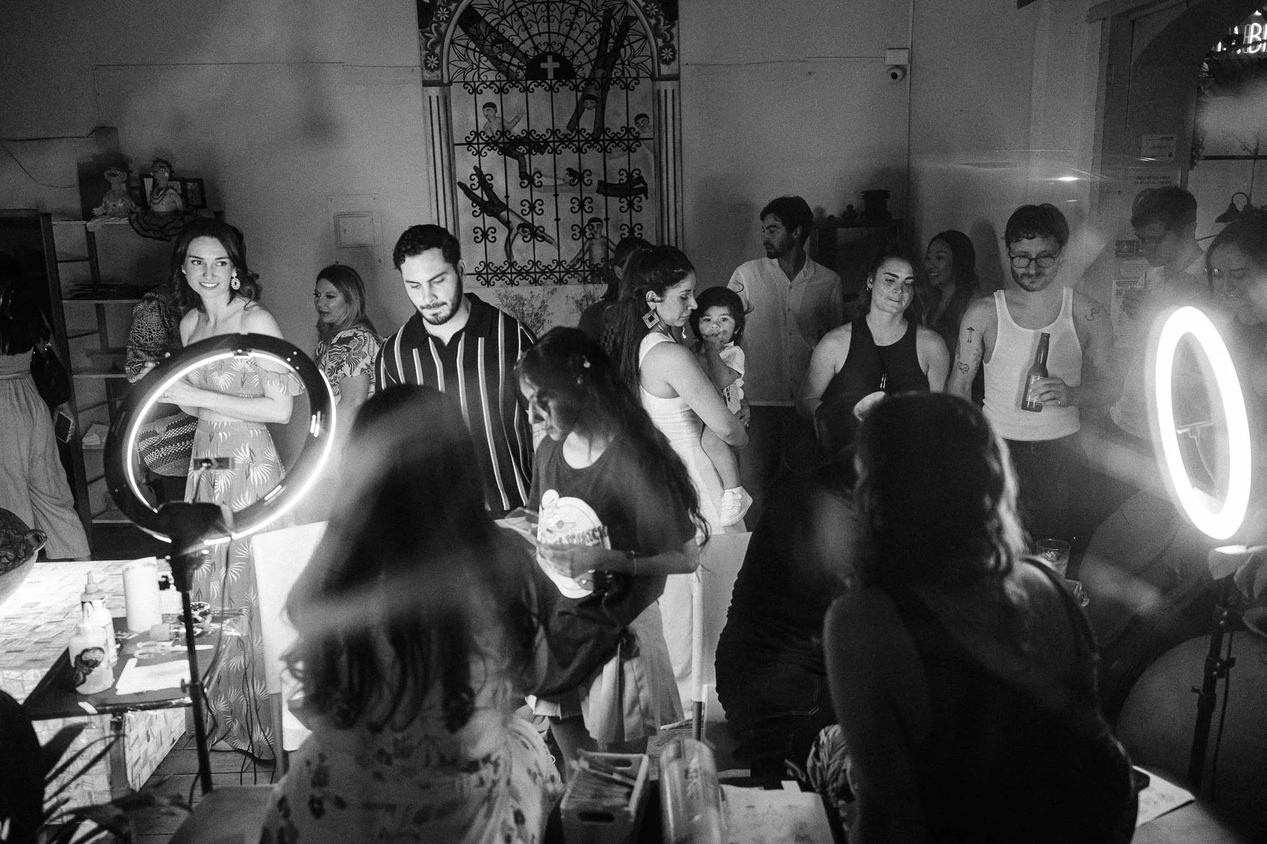 Wide shot of wedding guests getting tattooed in Mexico