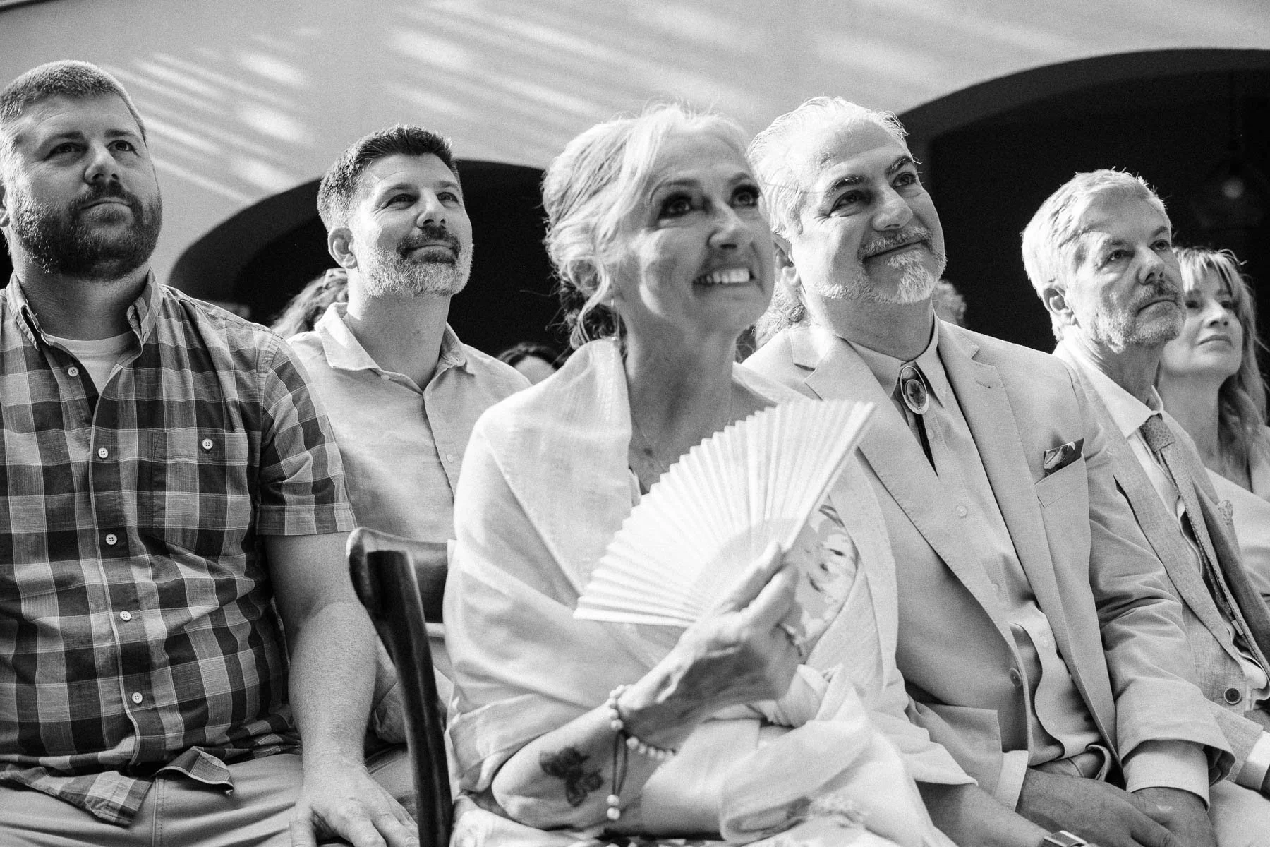Parents of the bride visibly moved during the wedding ceremony.