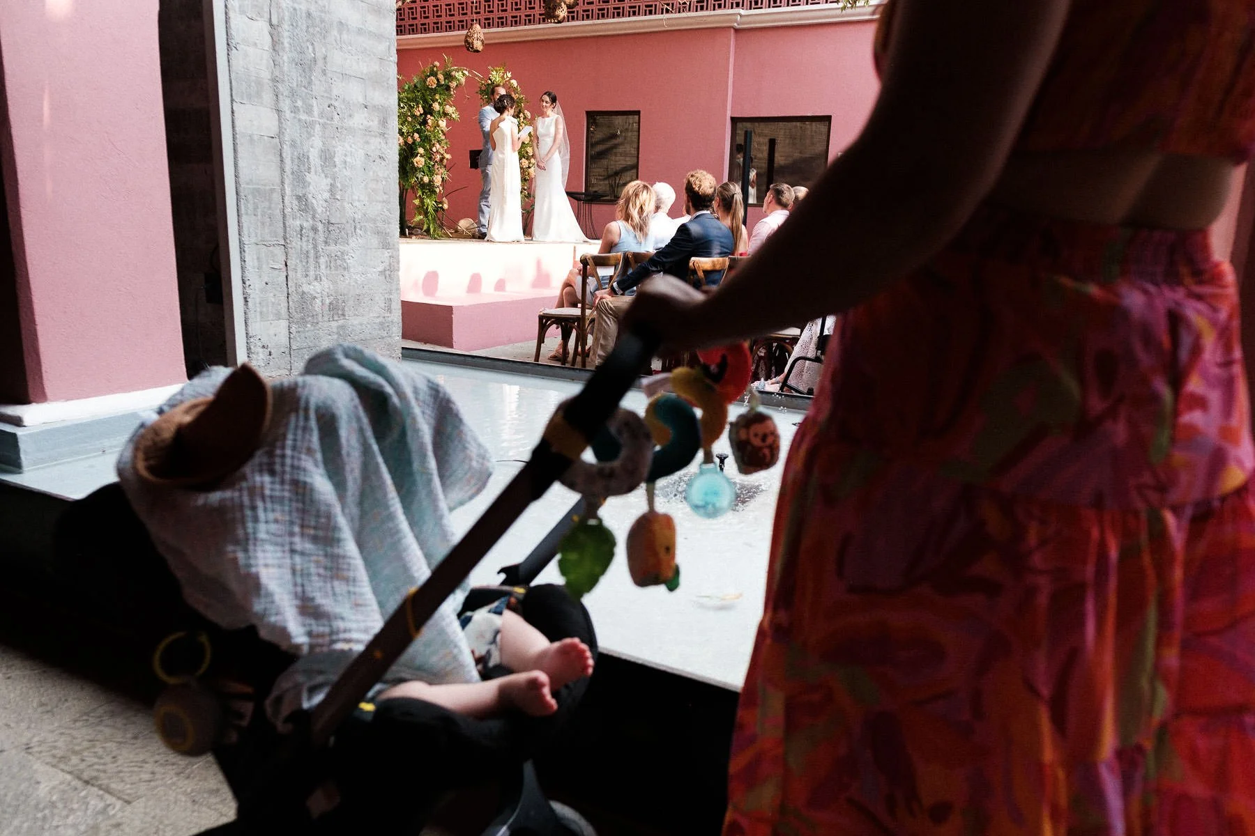A creative street photography perspective of the altar featuring a mother and baby.