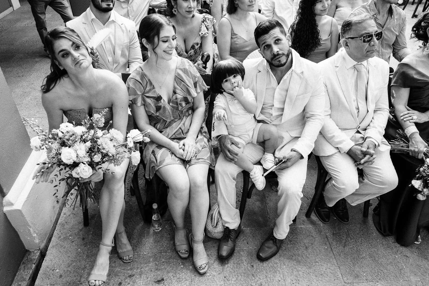 Bride's family showing raw emotion during the wedding ceremony.