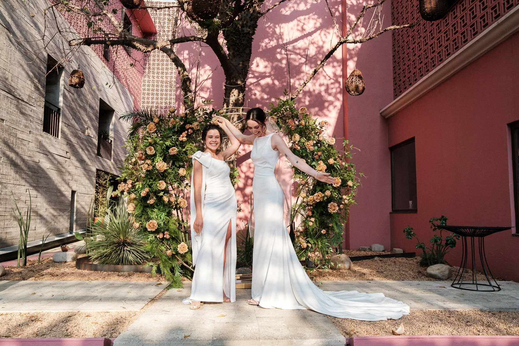 The brides looking at their families seconds after being officially married.