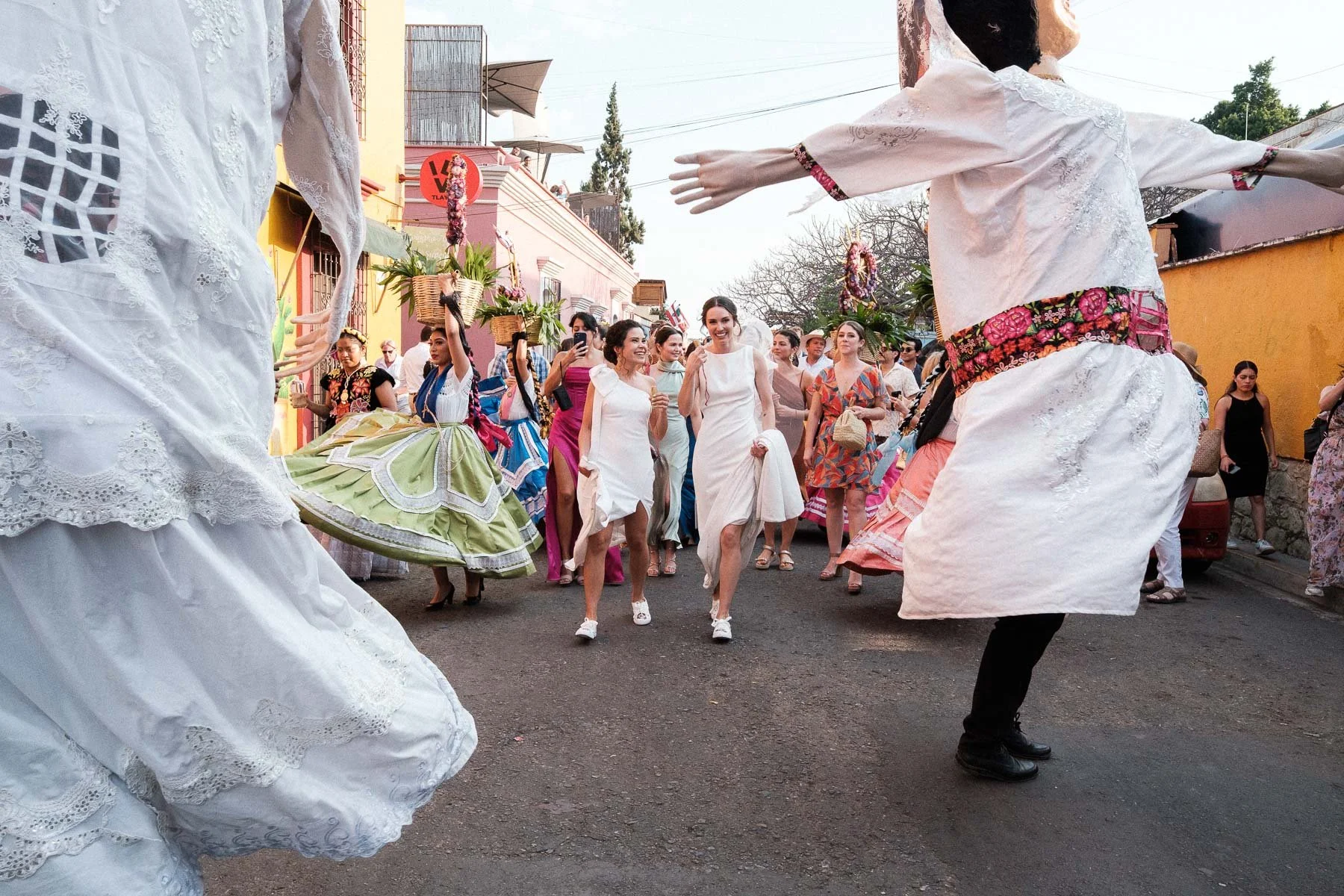 The colorful streets of Jalatlaco during a lively destination wedding Calenda.