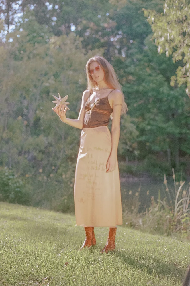 Naturally dyed, screen-printed, and beaded skirt. Hand beaded top.