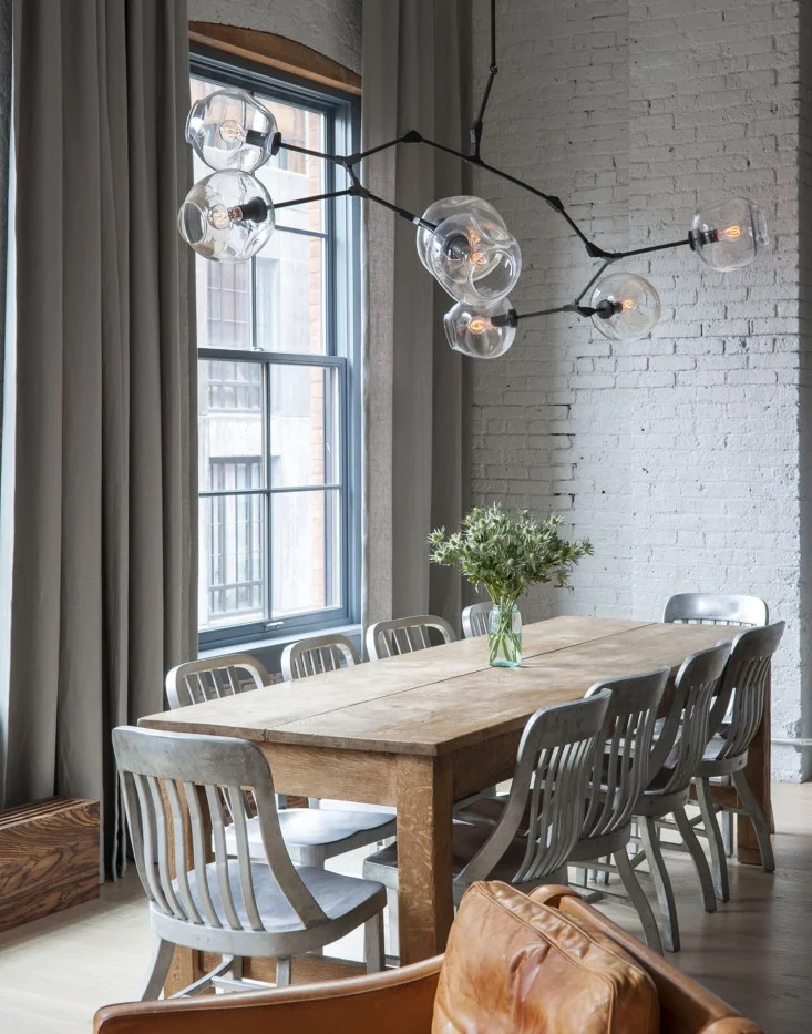 Dumbo-loft-Robertson-Pasanella-dining-table-Lindsey-Adelman-light-Remodelista.jpg