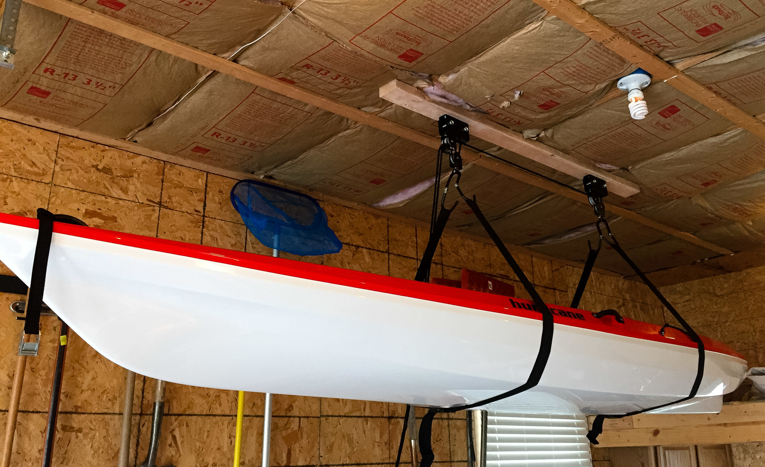get your kayaks properly stored with a hoist storage system