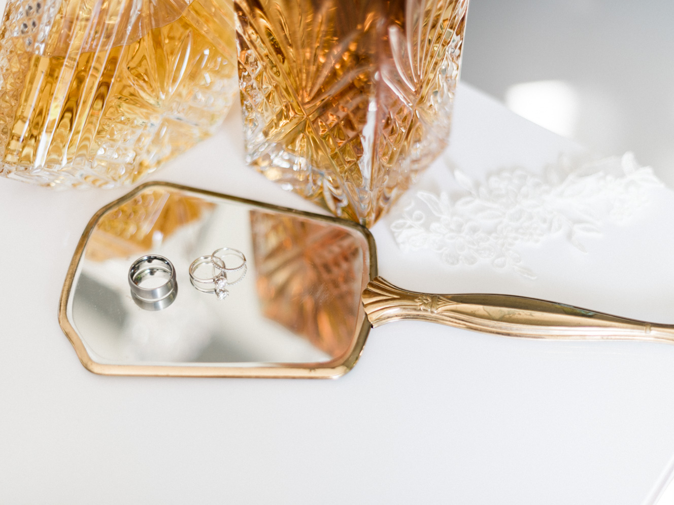 Wedding Ring Details With Lace Garter and Hand Held Vintage Mirror | kelseyandnate.com