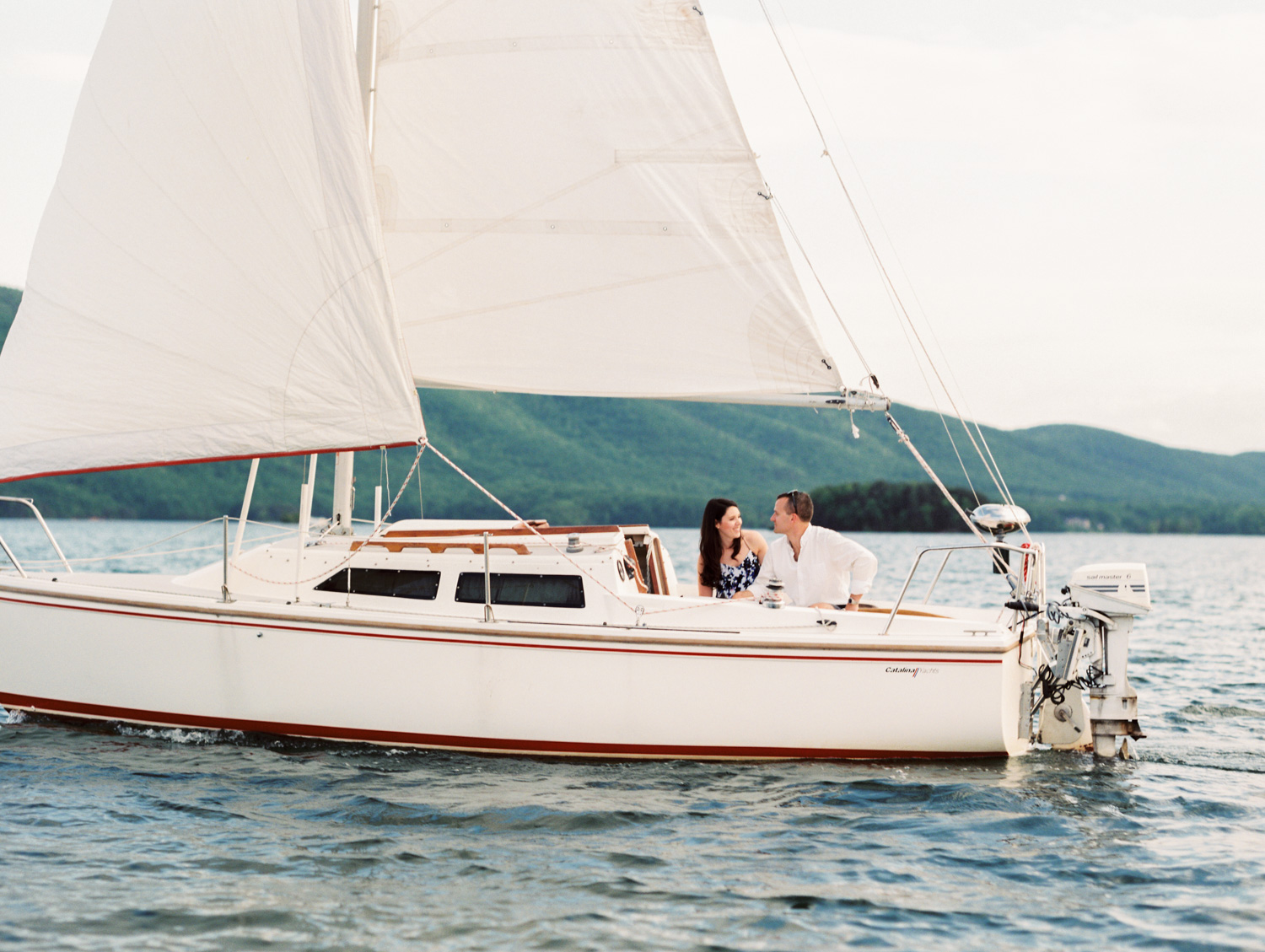 Megan & Court | Sailboat Engagement Photos | Smith Mountain Lake, Virginia | Kelsey & Nate | kelseyandnate.com | Nautical Photography