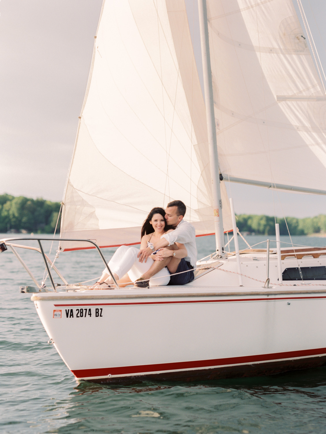 Megan & Court | Sailboat Engagement Photos | Smith Mountain Lake, Virginia | Kelsey & Nate | kelseyandnate.com | Nautical Photography