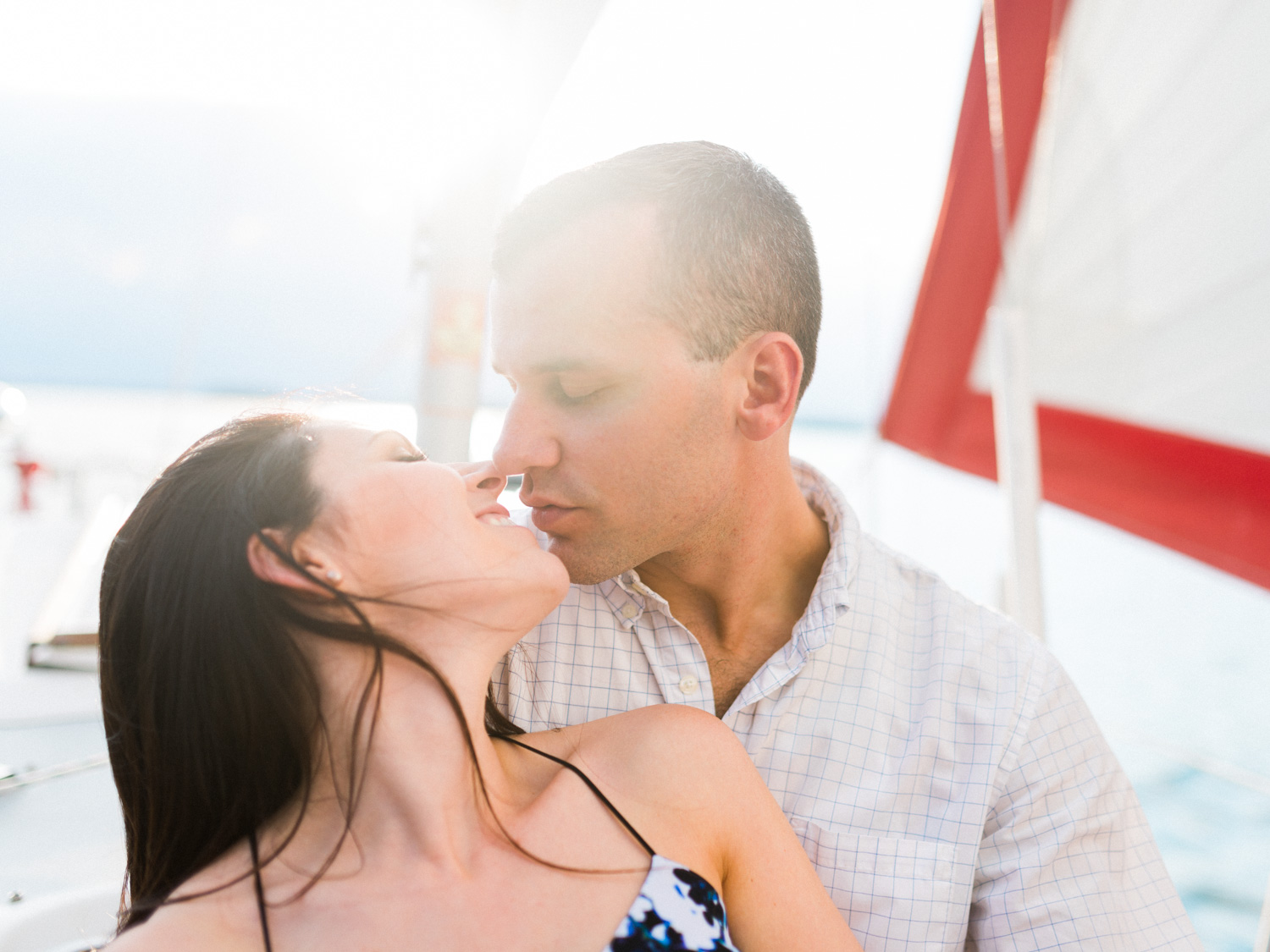 Megan & Court | Sailboat Engagement Photos | Smith Mountain Lake, Virginia | Kelsey & Nate | kelseyandnate.com | Nautical Photography