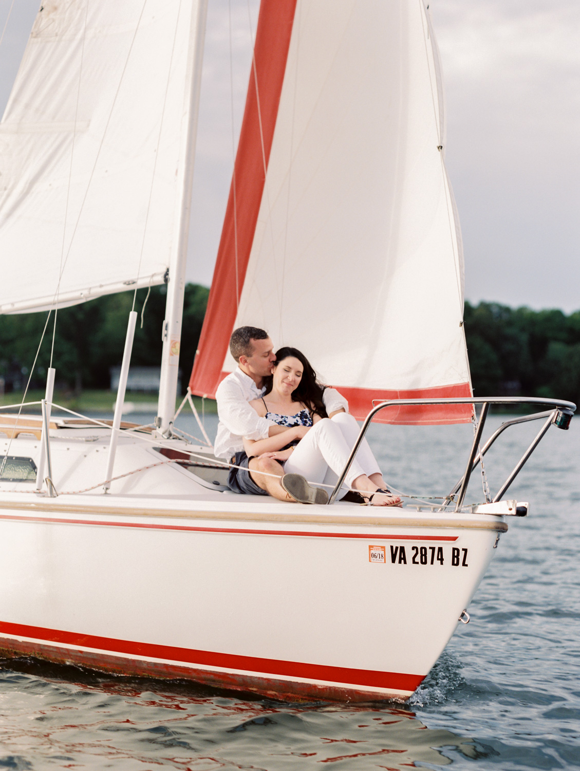 Megan & Court | Sailboat Engagement Photos | Smith Mountain Lake, Virginia | Kelsey & Nate | kelseyandnate.com | Nautical Photography
