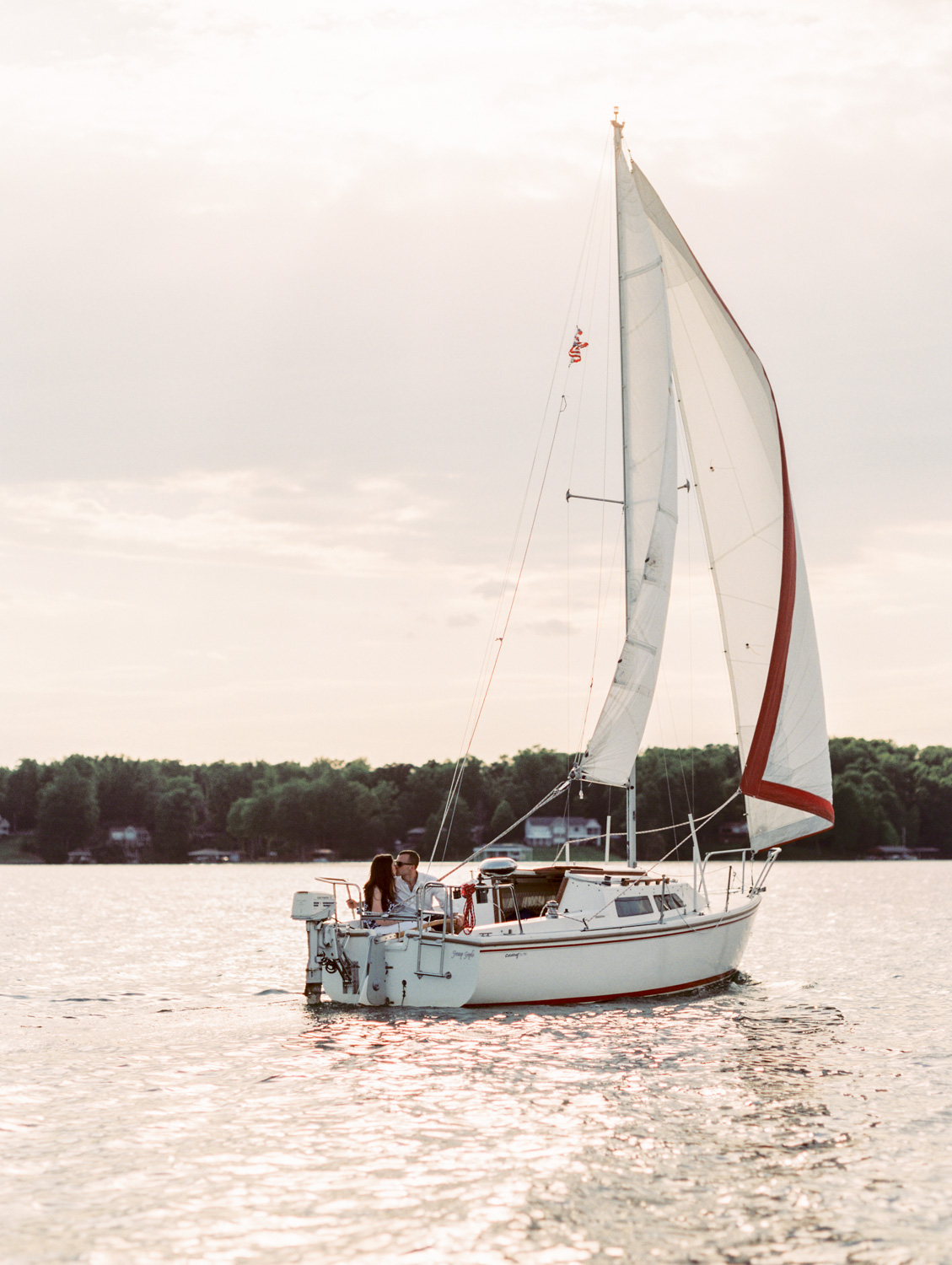 Megan & Court | Sailboat Engagement Photos | Smith Mountain Lake, Virginia | Kelsey & Nate | kelseyandnate.com | Nautical Photography