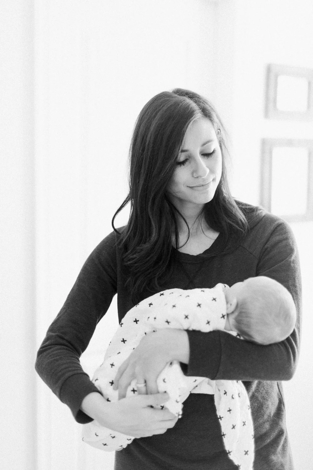 West Elm Inspired Newborn Lifestyle Session | Lynchburg Photographer | Kelsey & Nate | kelseyandnate.com | Gold Bird Mobile | Modern Nursery | White Nursery and Velvet Blue Rocker | Modern Burlap