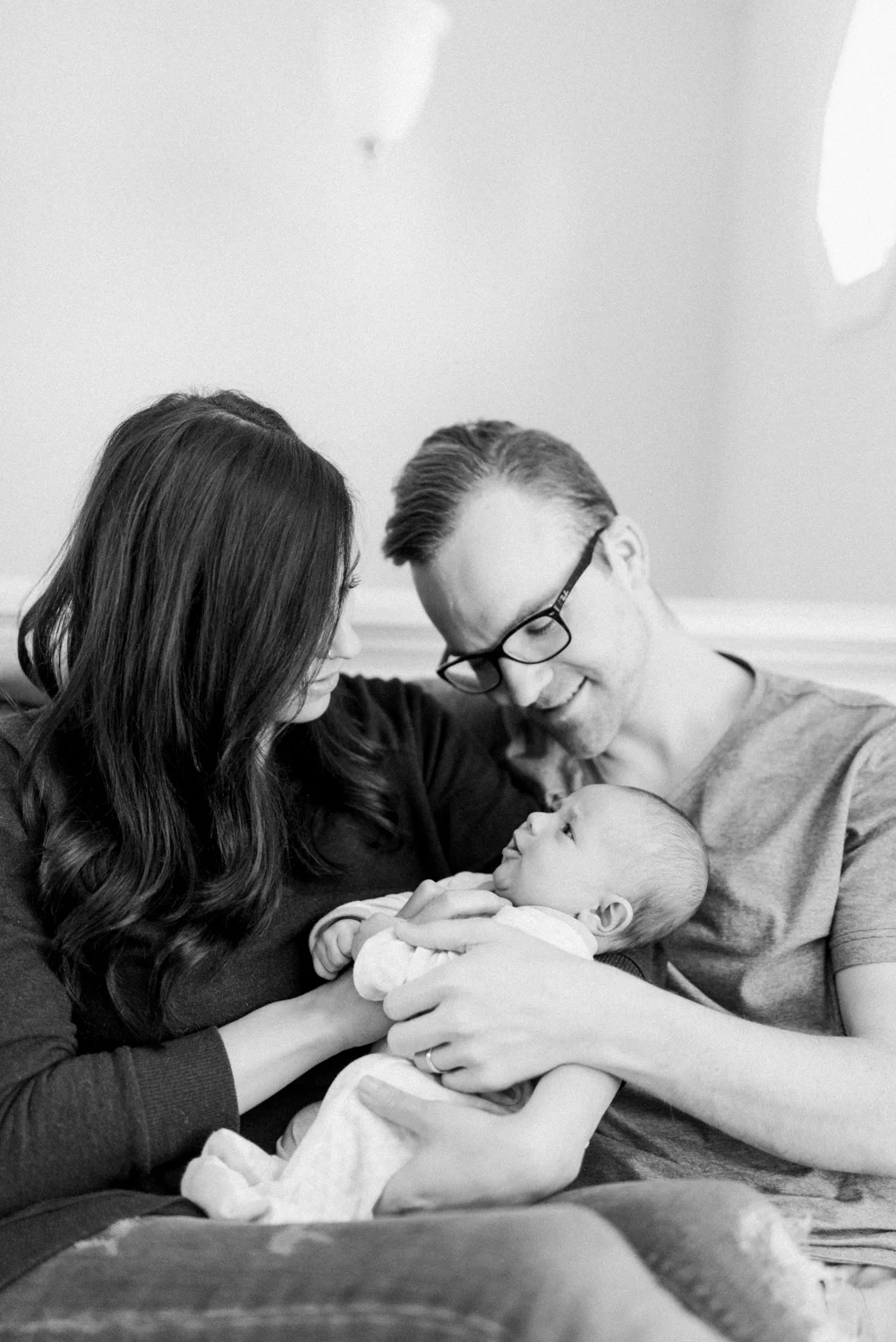 West Elm Inspired Newborn Lifestyle Session | Lynchburg Photographer | Kelsey & Nate | kelseyandnate.com | Gold Bird Mobile | Modern Nursery | White Nursery and Velvet Blue Rocker | Modern Burlap
