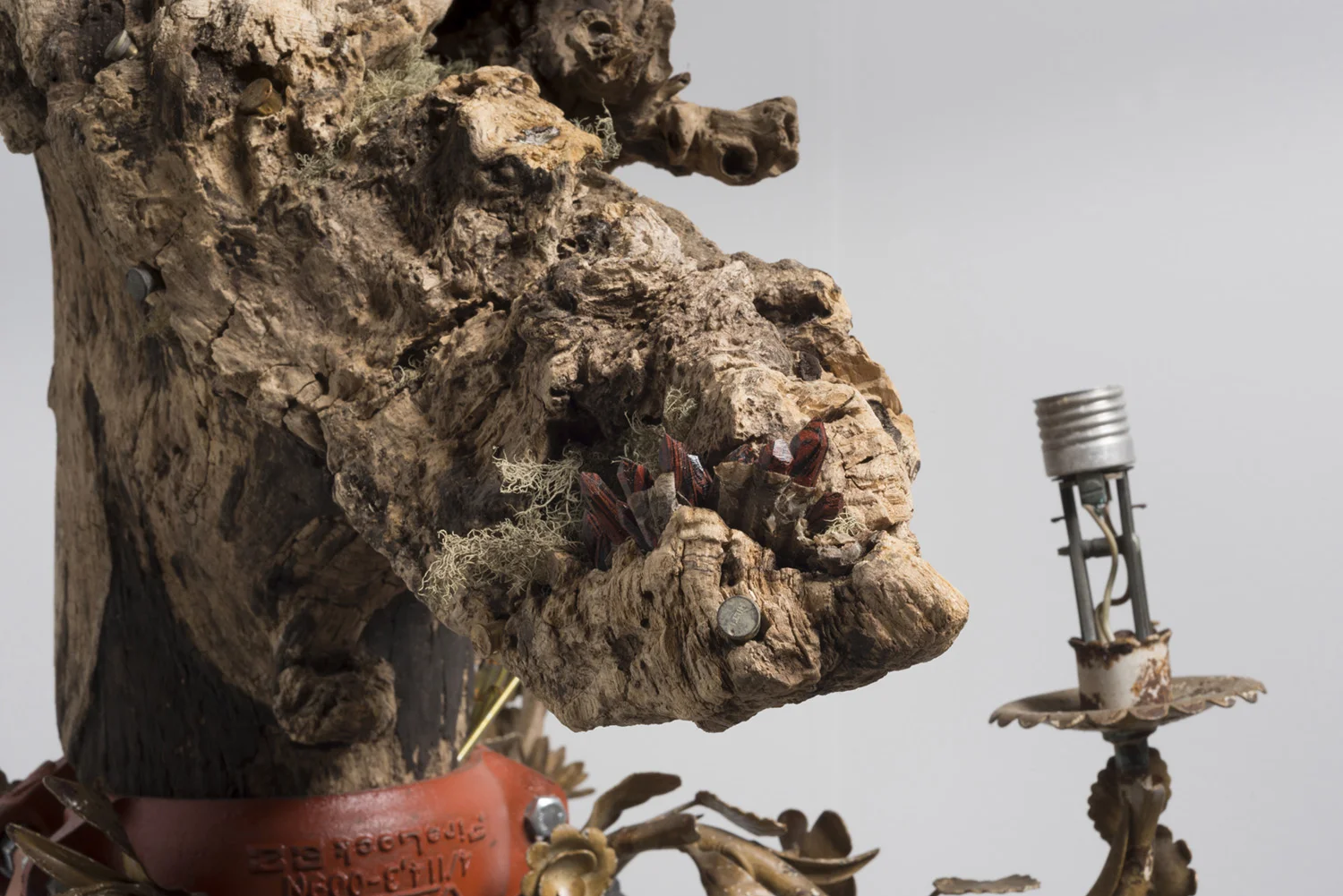 Lorna Williams-spoils-2013-chandelier fixtures, table legs, concrete, chain, plumbing hardware, Spanish moss, ukulele, root system, nails, wasp hive, acrylic, bullet casings-45x20x29-detail-5(2).jpg