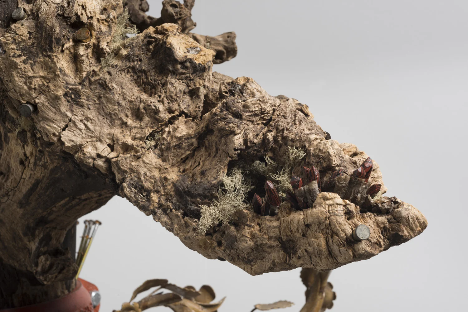 Lorna Williams-spoils-2013-chandelier fixtures, table legs, concrete, chain, plumbing hardware, Spanish moss, ukulele, root system, nails, wasp hive, acrylic, bullet casings-45x20x29-detail-6(2).jpg