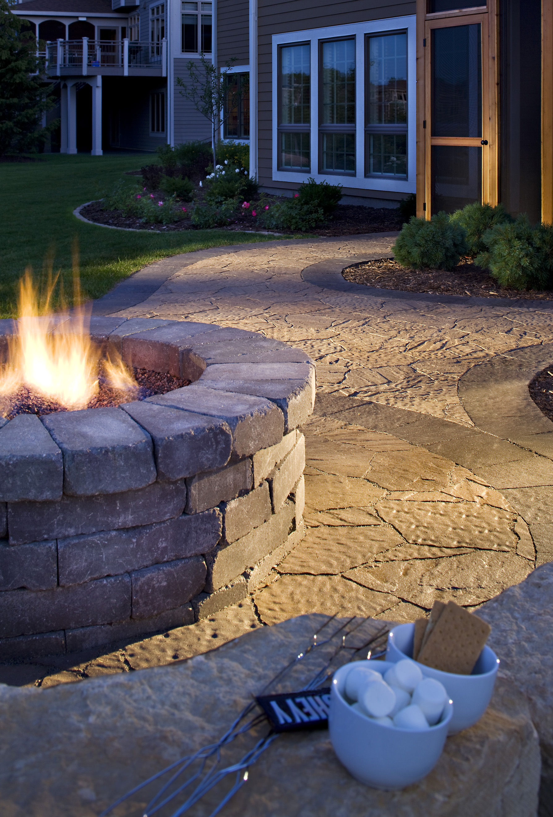 fire pit sitting wall paver patio smores relax cozy