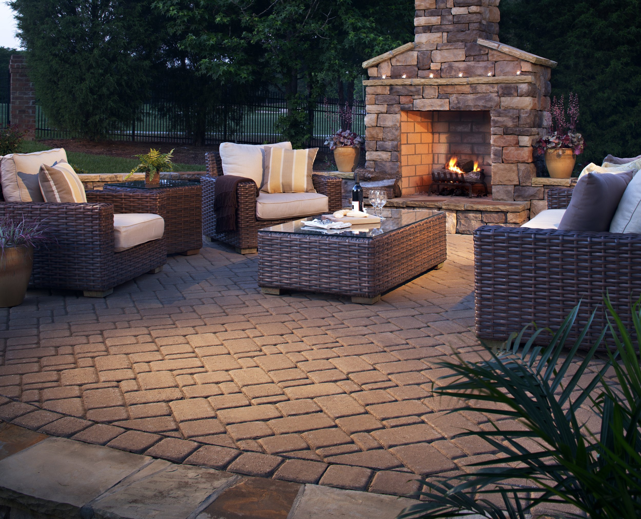 outdoor fireplace paver patio landscape plantings 