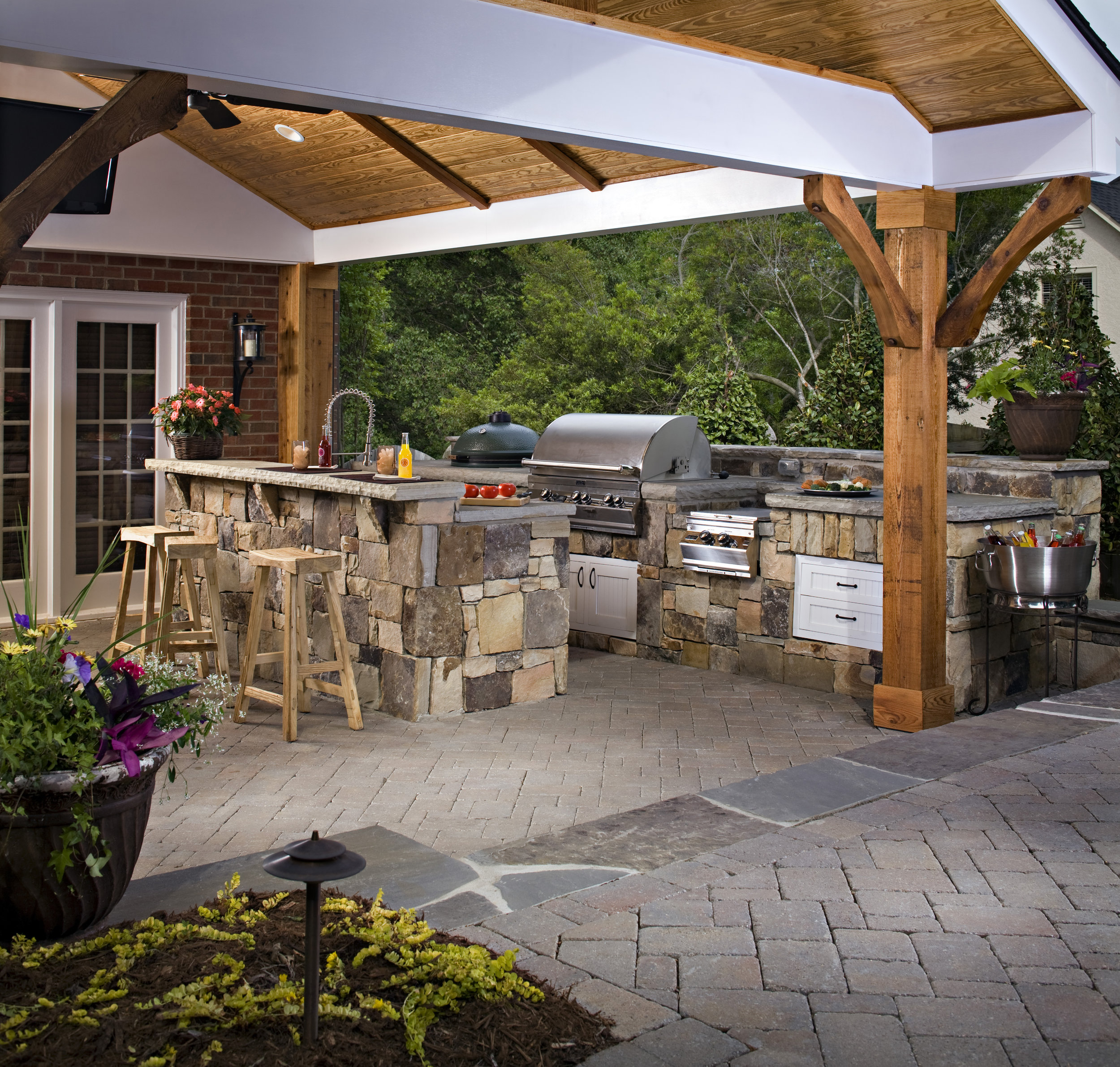 outdoor kitchen covered room patio dining landscape design