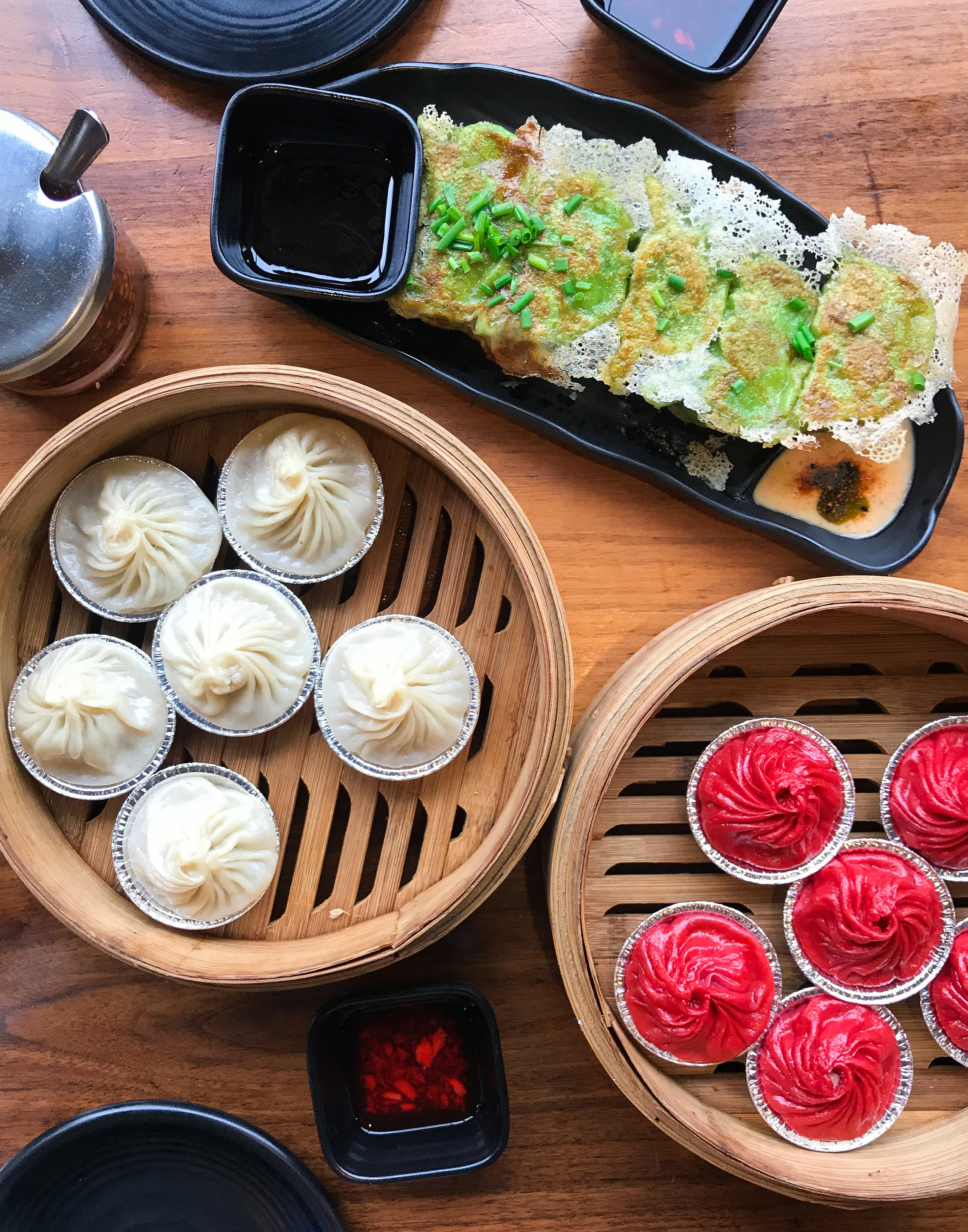  PLATES AND PLATES OF COLORFUL DUMPLINGS 